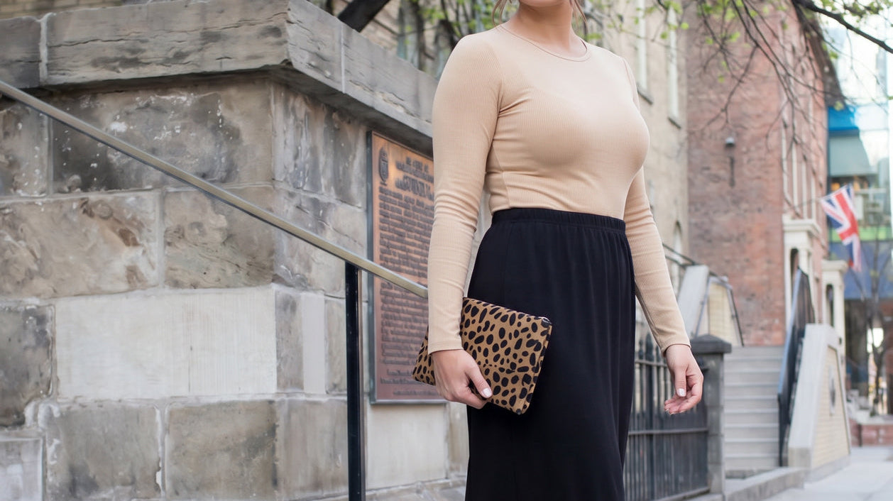 Woman wearing the Nuggles modest 31 inch Classic Skirt in black