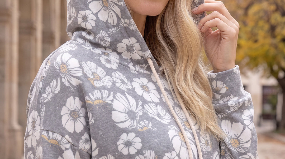Nuggles Hoodie Dress in Daisy Moon worn with the hood up