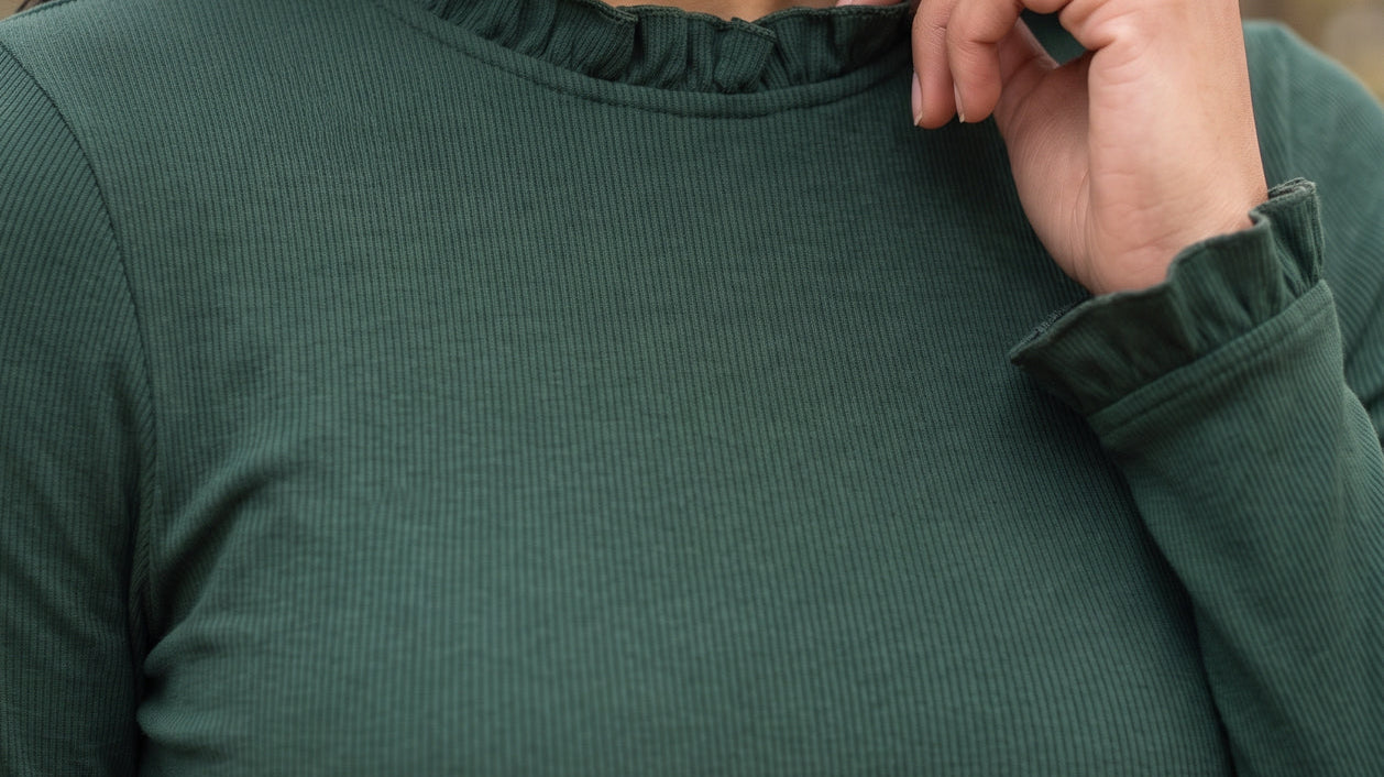 Woman wearing the modest Bethany ribbed long sleeve top and matching midi skirt in Pine Green for a fall outfit