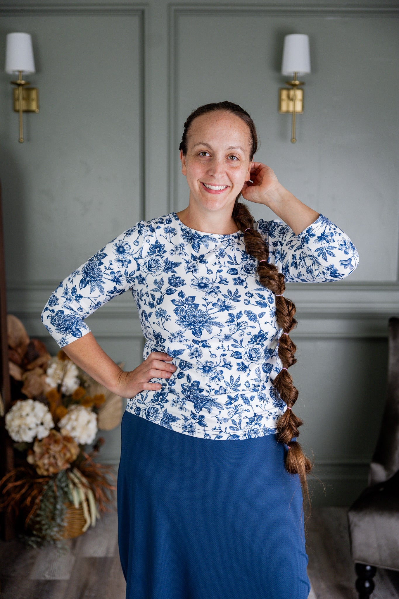 Woman modeling our modest Signature denim skirt. Available in 3 lengths. Several options to choose from.