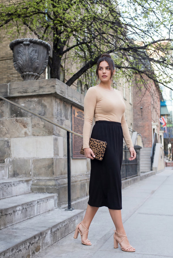 Model wearing Nuggles® 31" Classic Skirt in Black