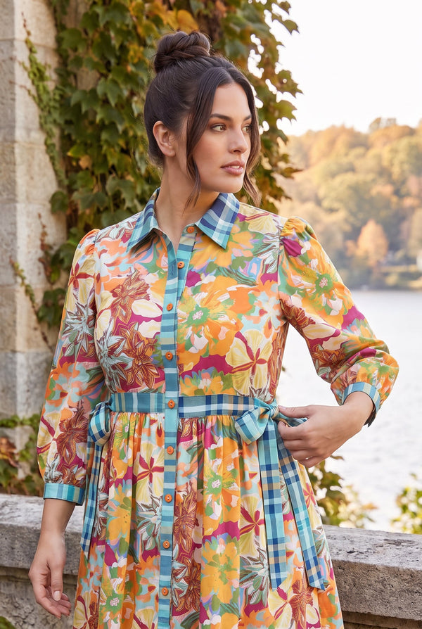 Model wearing Nuggles® Leila Dress in Marigold