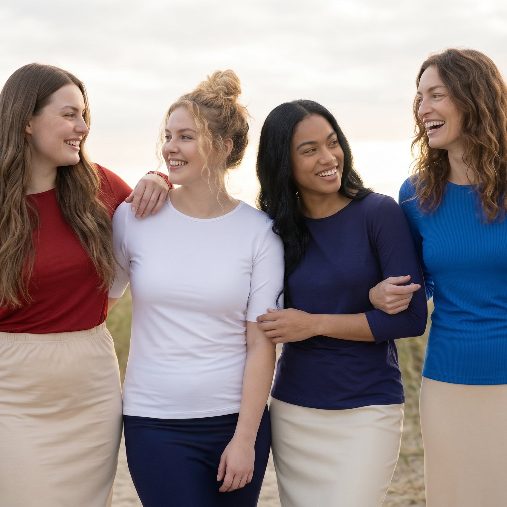 A group of women wearing red, white, and blue tees.