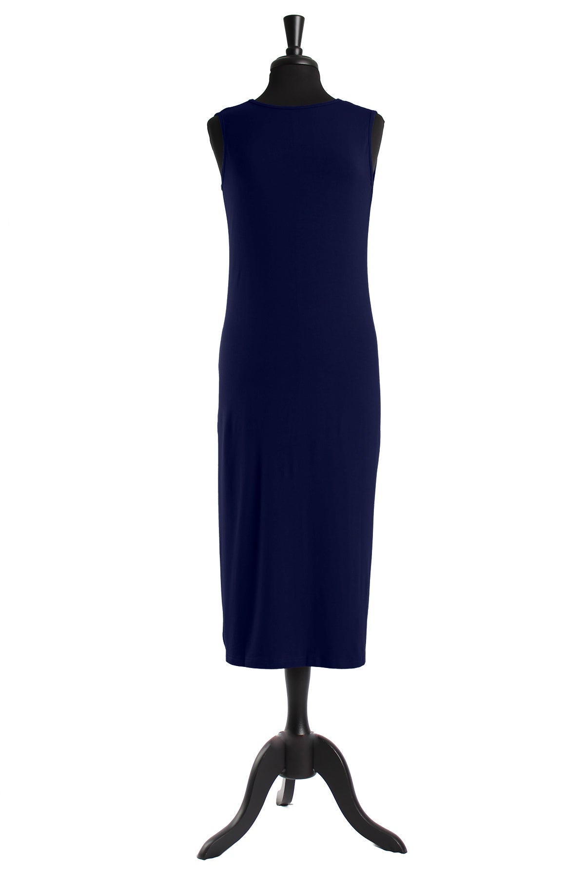A mannequin with a sleeveless tank layering, midi length dress.