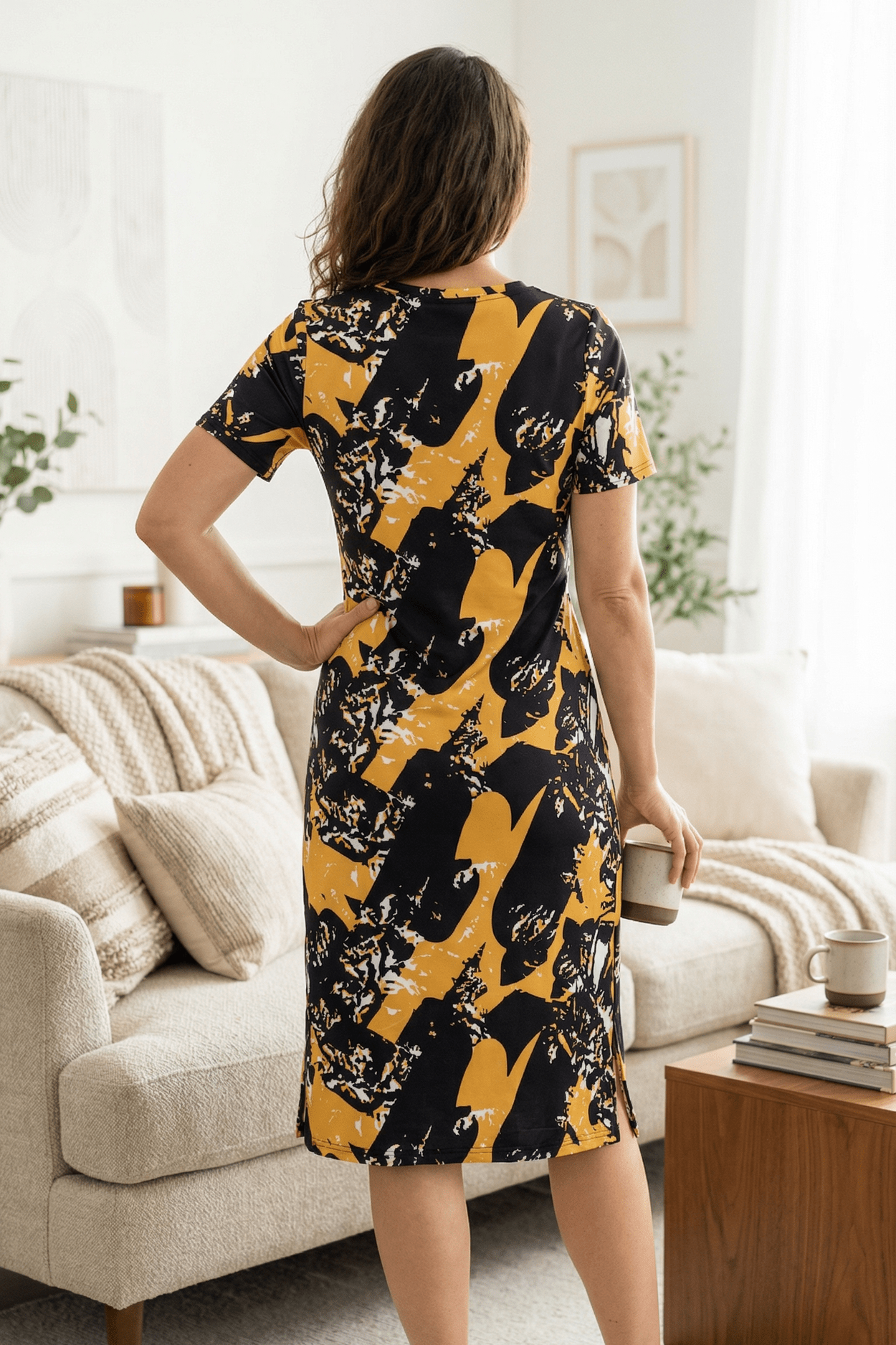 Model wearing the Nuggles® Aviva Dress in Golden Drift