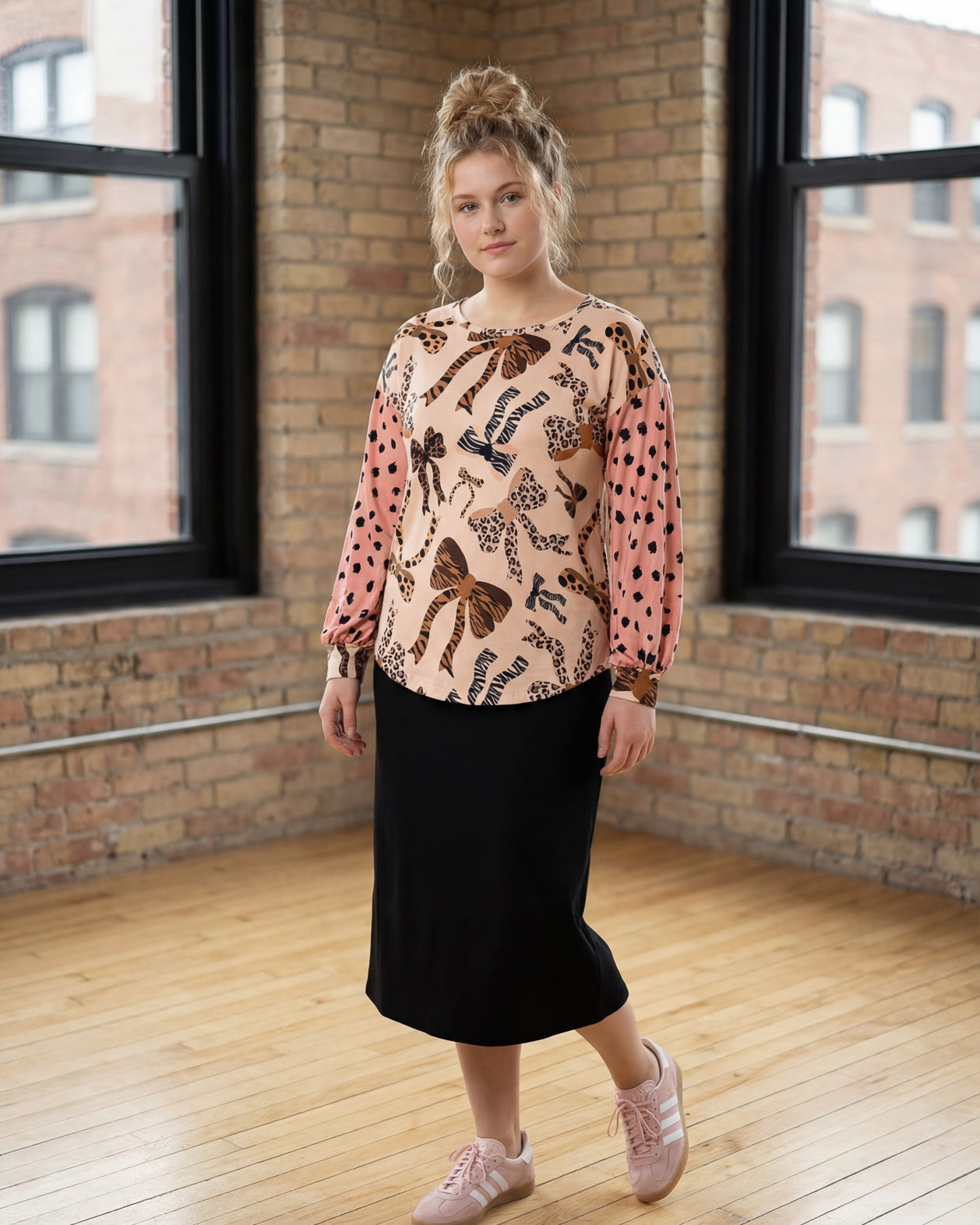 Model wearing Nuggles® Bryauna Top in Love & Leopard