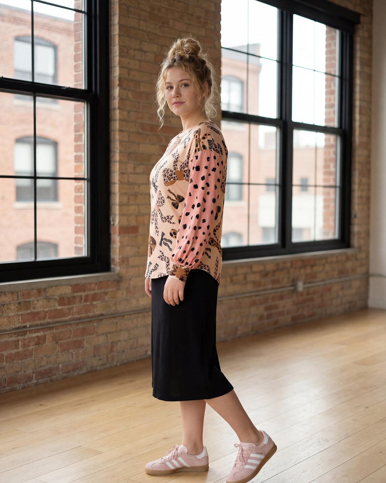 Model wearing Nuggles® Bryauna Top in Love & Leopard