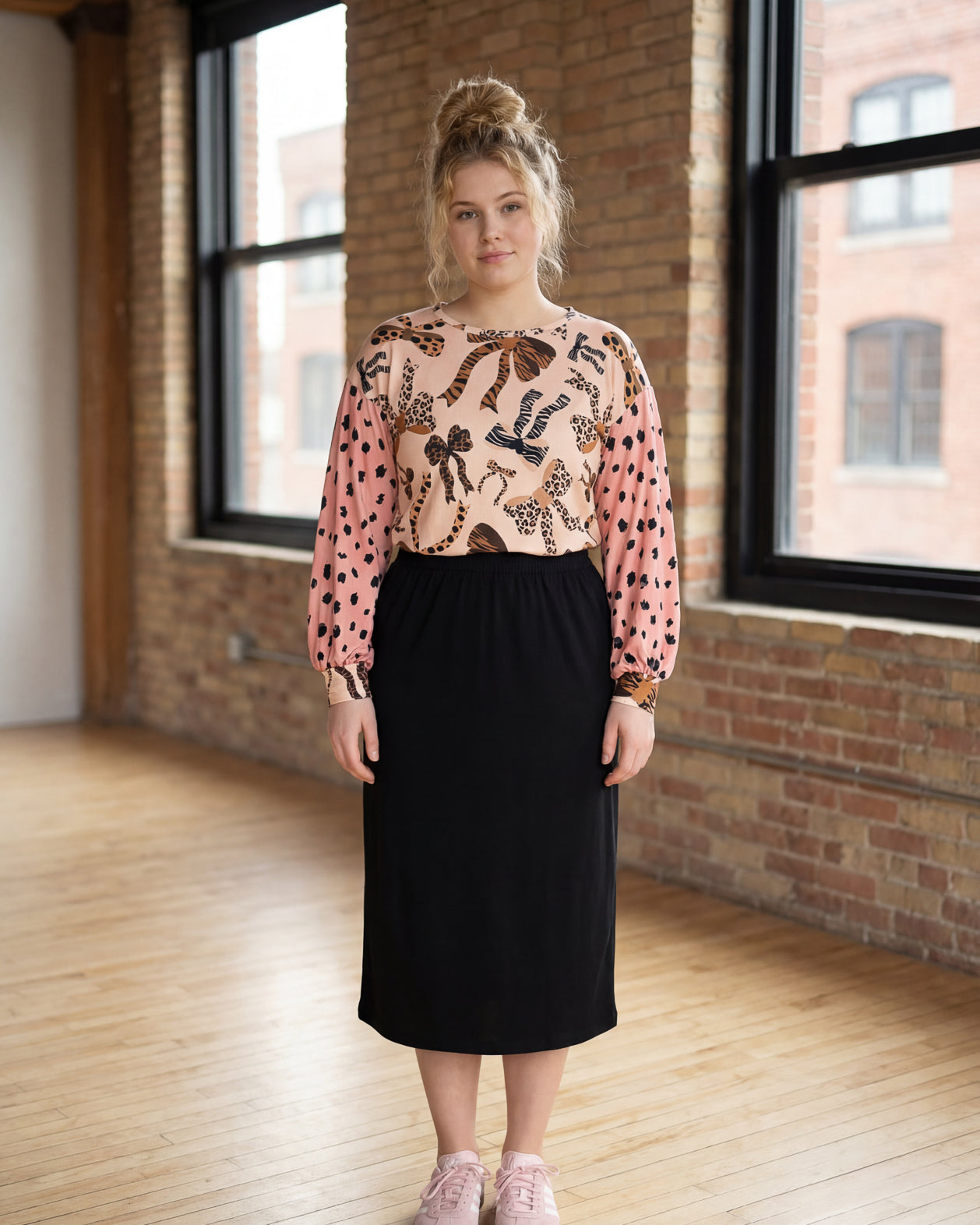 Model wearing Nuggles® Bryauna Top in Love & Leopard