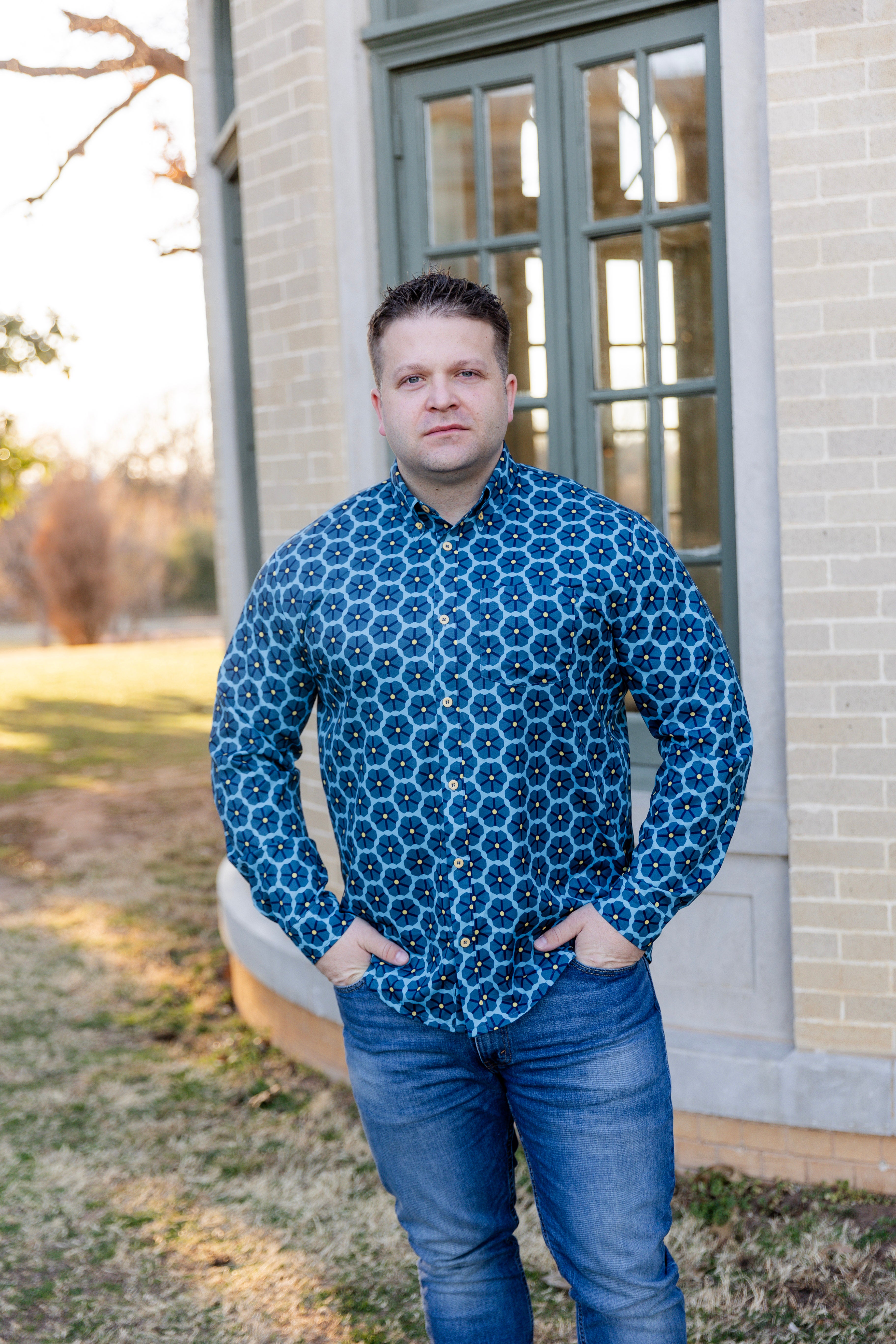 Model wearing Nuggles® Mens' Button Down Shirt Forge Tile