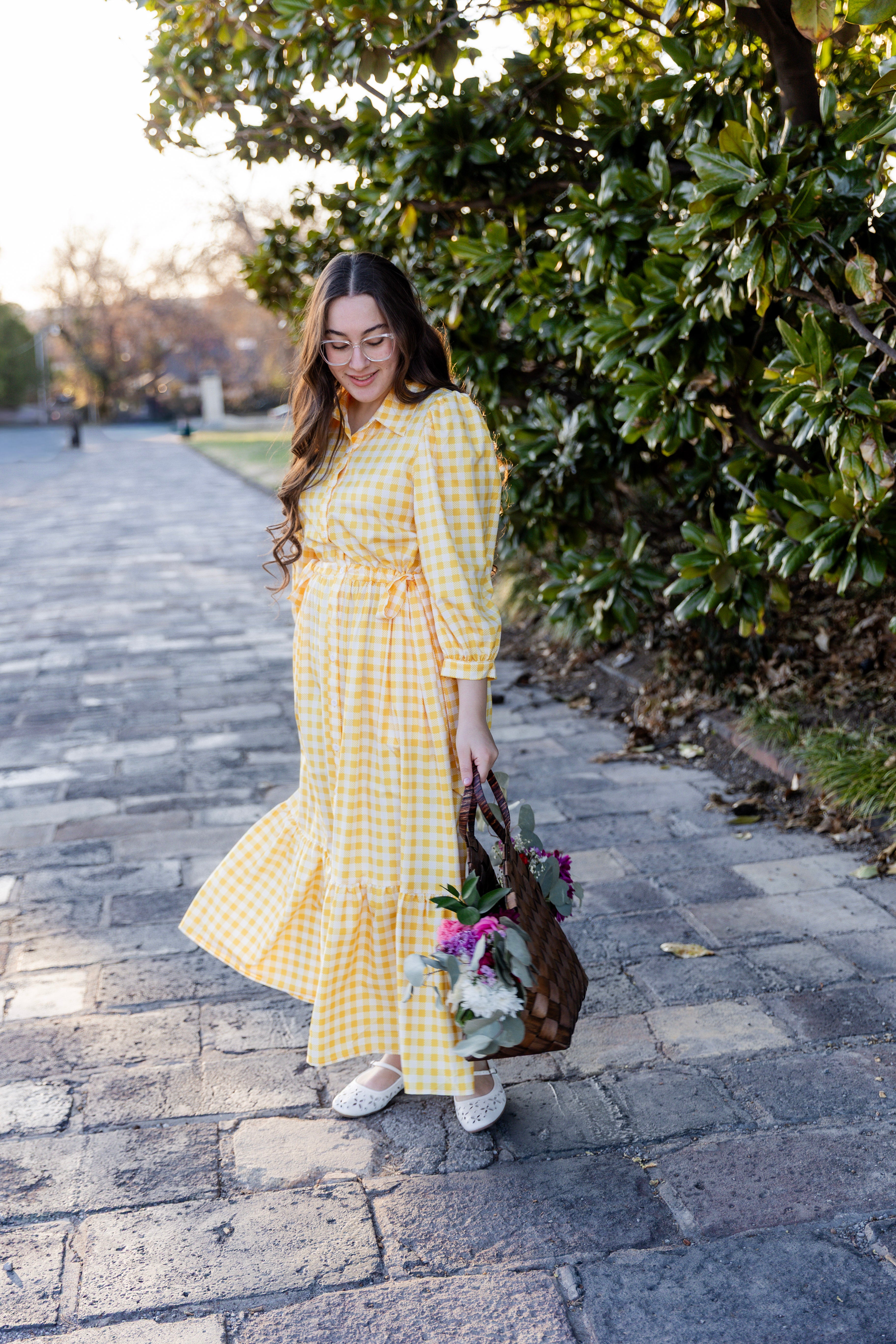 Model wearing the Nuggles® Leila Dress in Sunshine Check