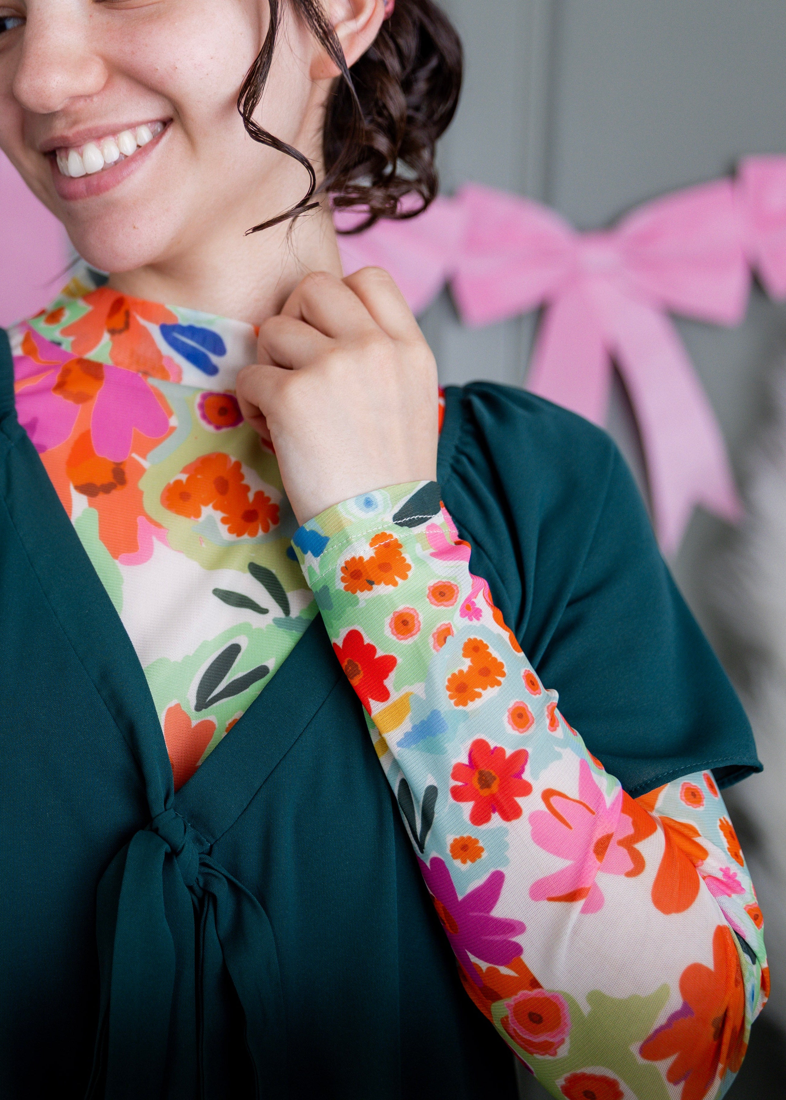 Model wearing Nuggles® Mesh Tee top in Confetti Bloom