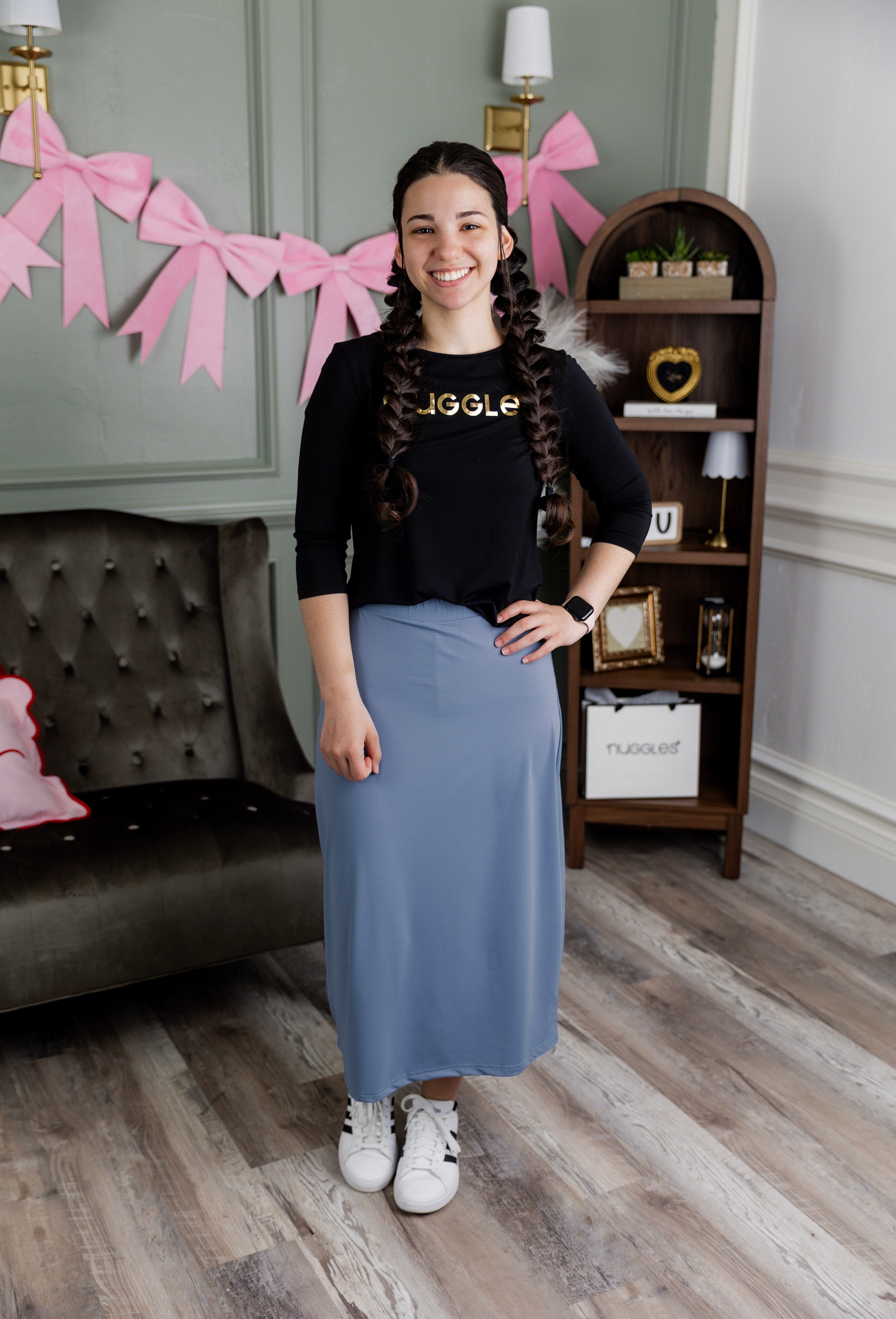 Model wearing Nuggles® 31" All-Sport Skirt in Baby Blue