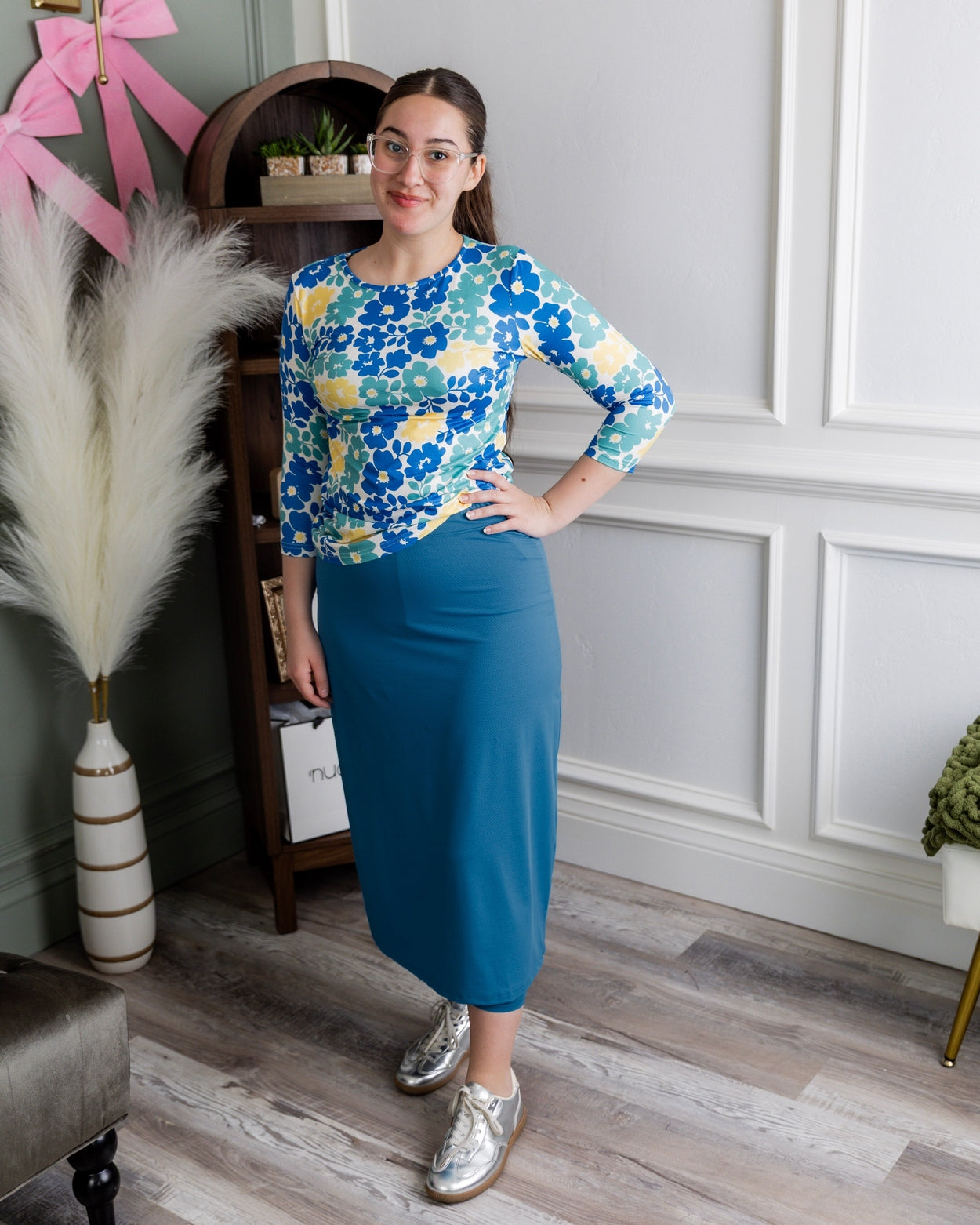 Model wearing Nuggles® 31" All-Sport Skirt in Turquoise