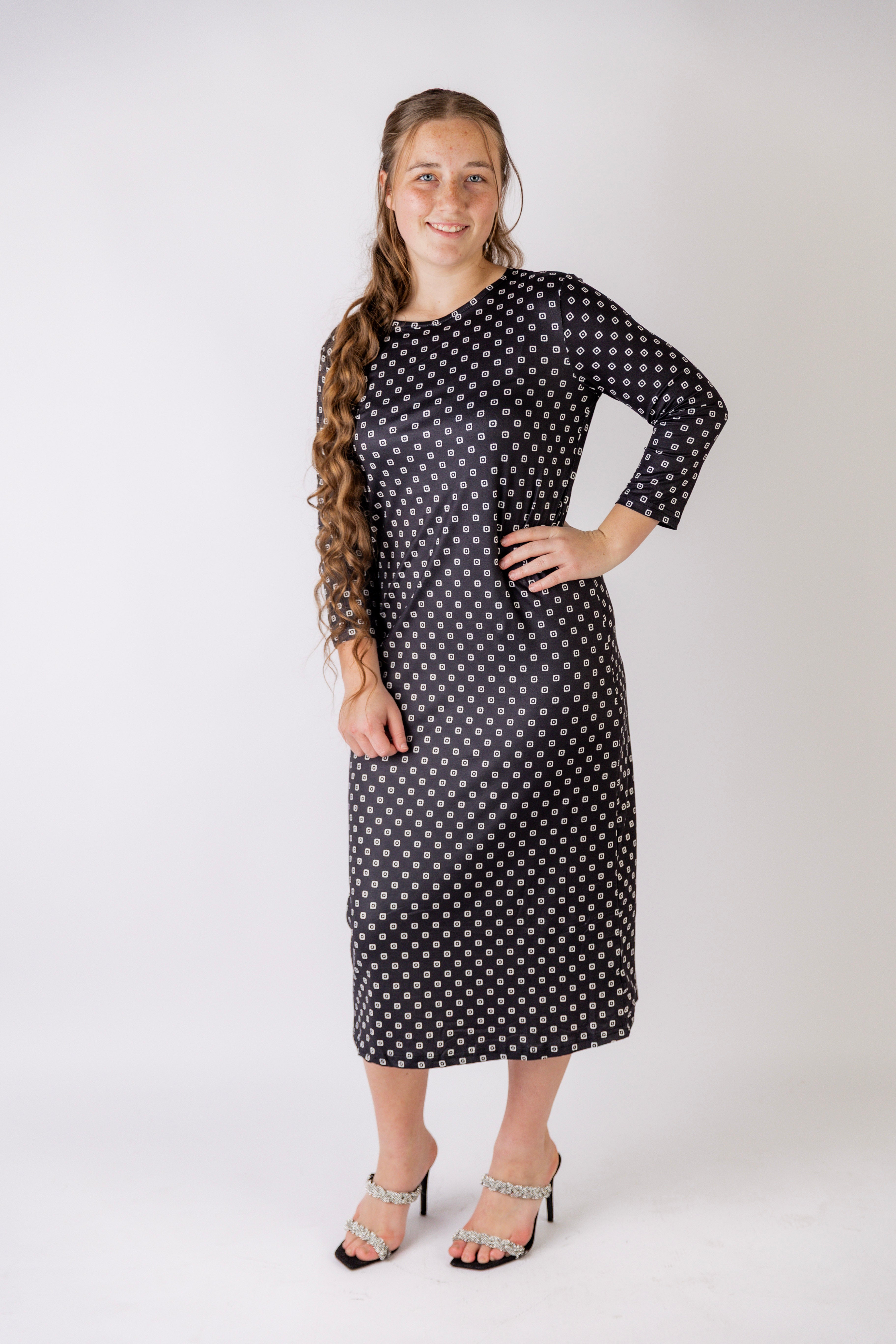 Model wearing the Nuggles® Original Midi Layering Dress in Midnight Mist