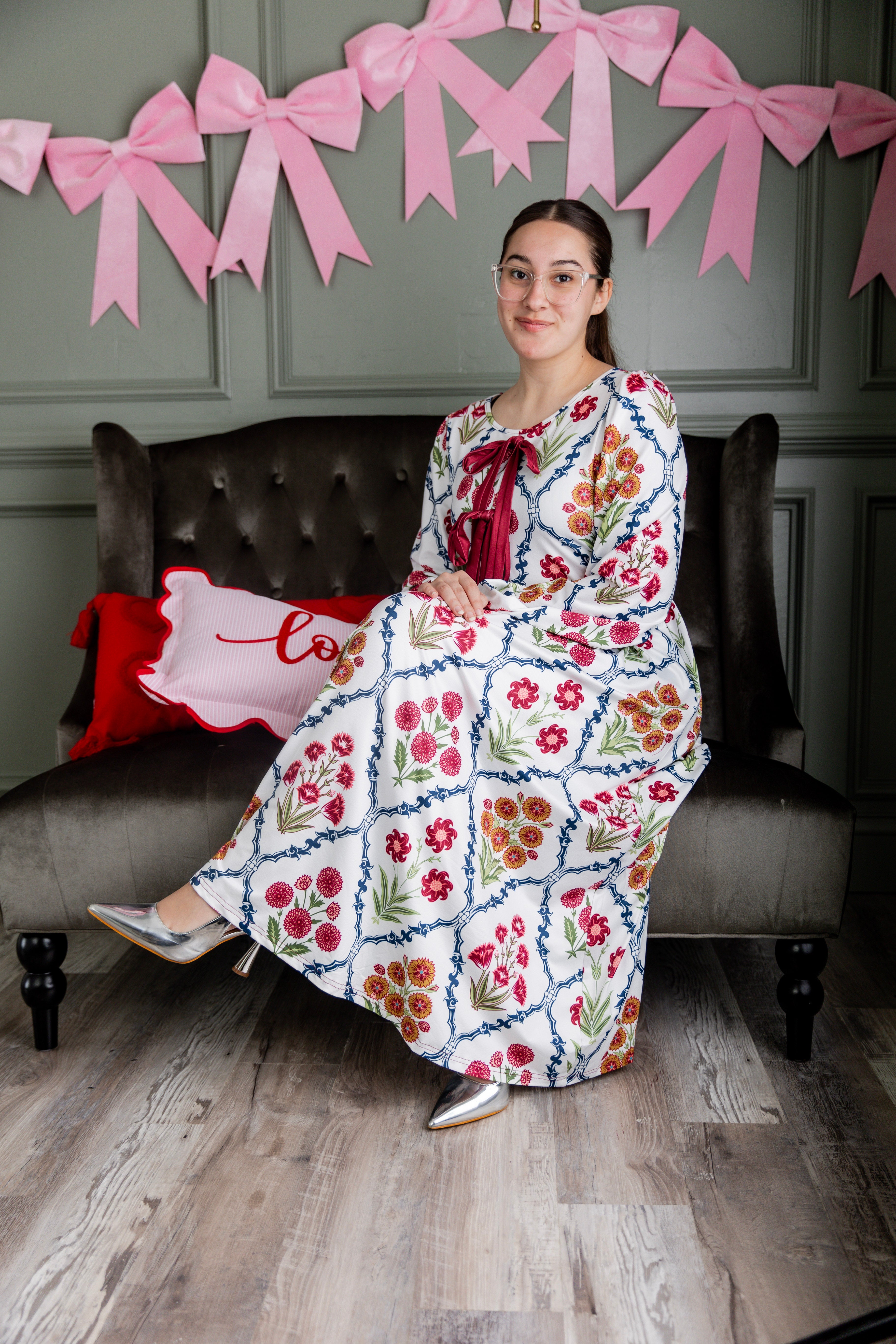 Model wearing the Nuggles® Addison Dress in Wildflower Trellis