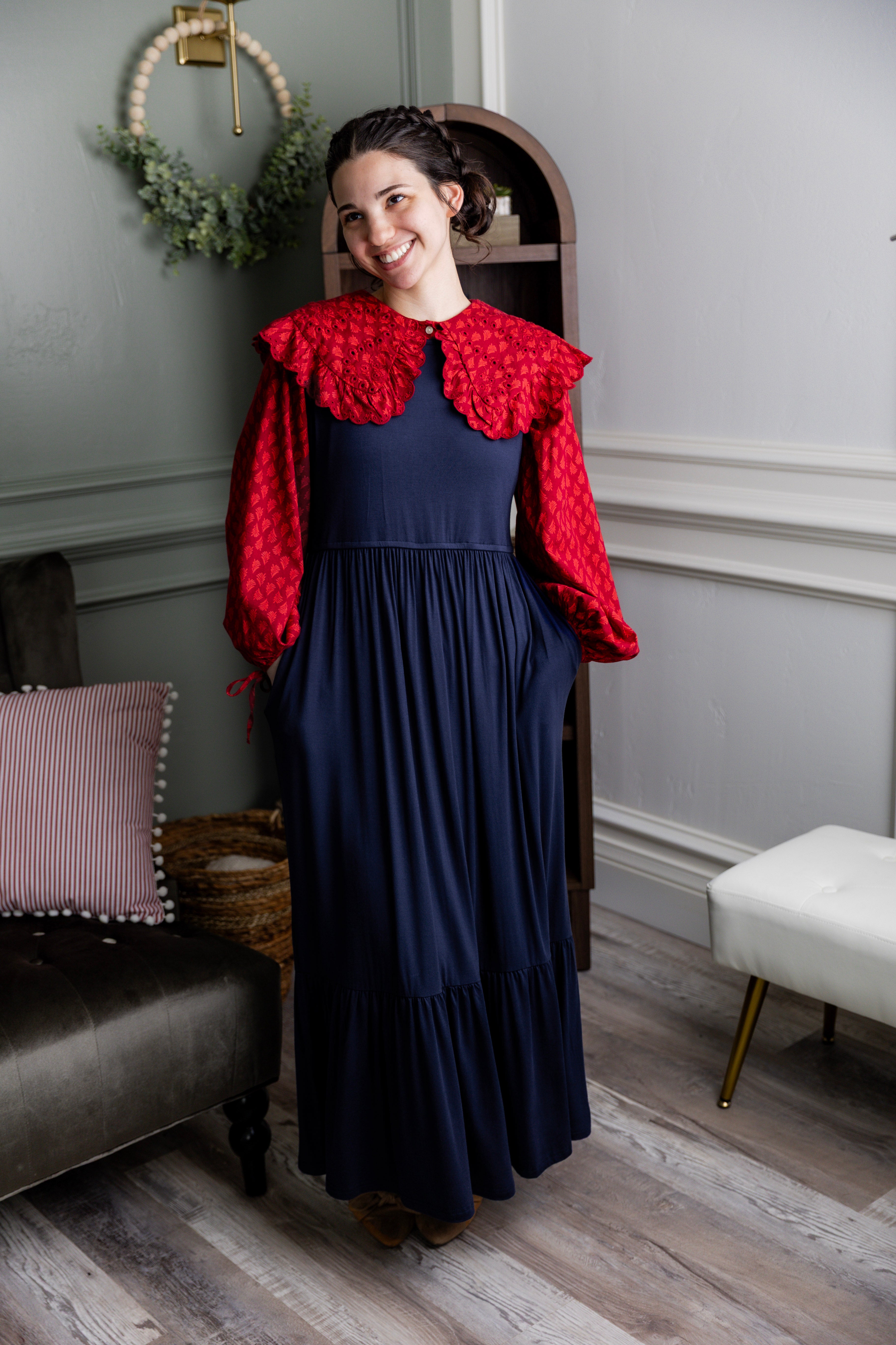 Model wearing the Nuggles® Riley Dress in Navy