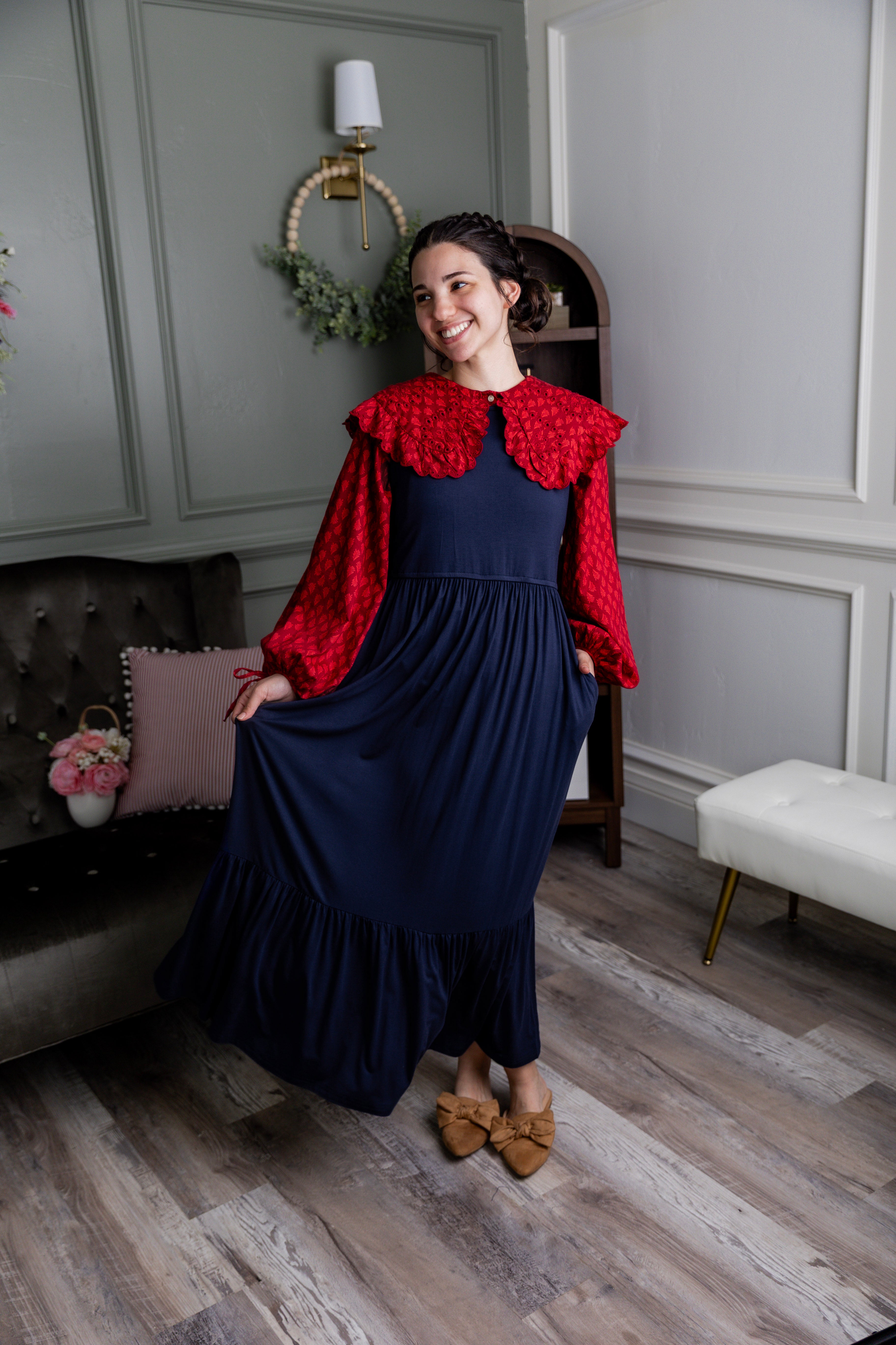 Model wearing the Nuggles® Riley Dress in Navy