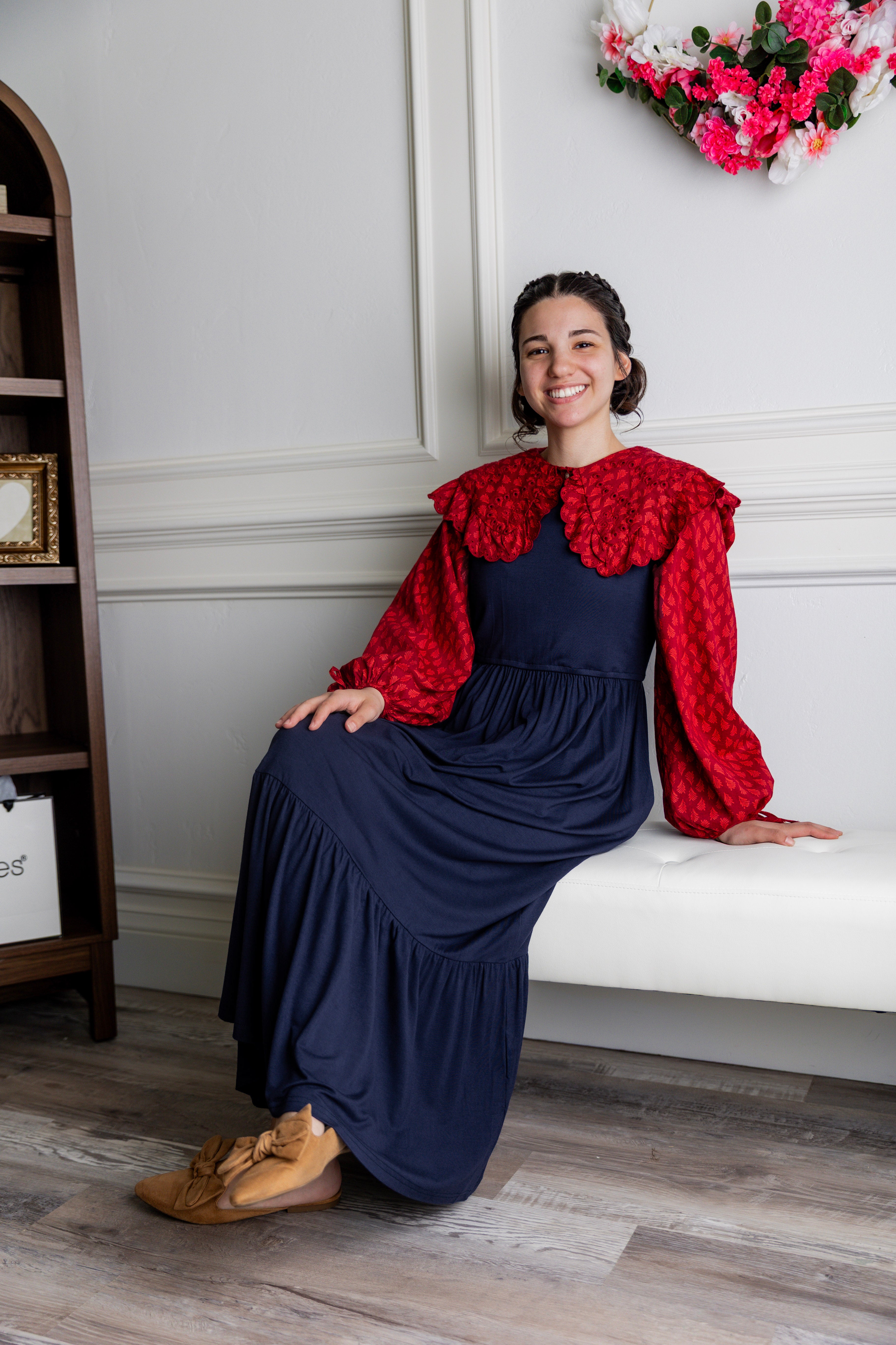 Model wearing the Nuggles® Riley Dress in Navy