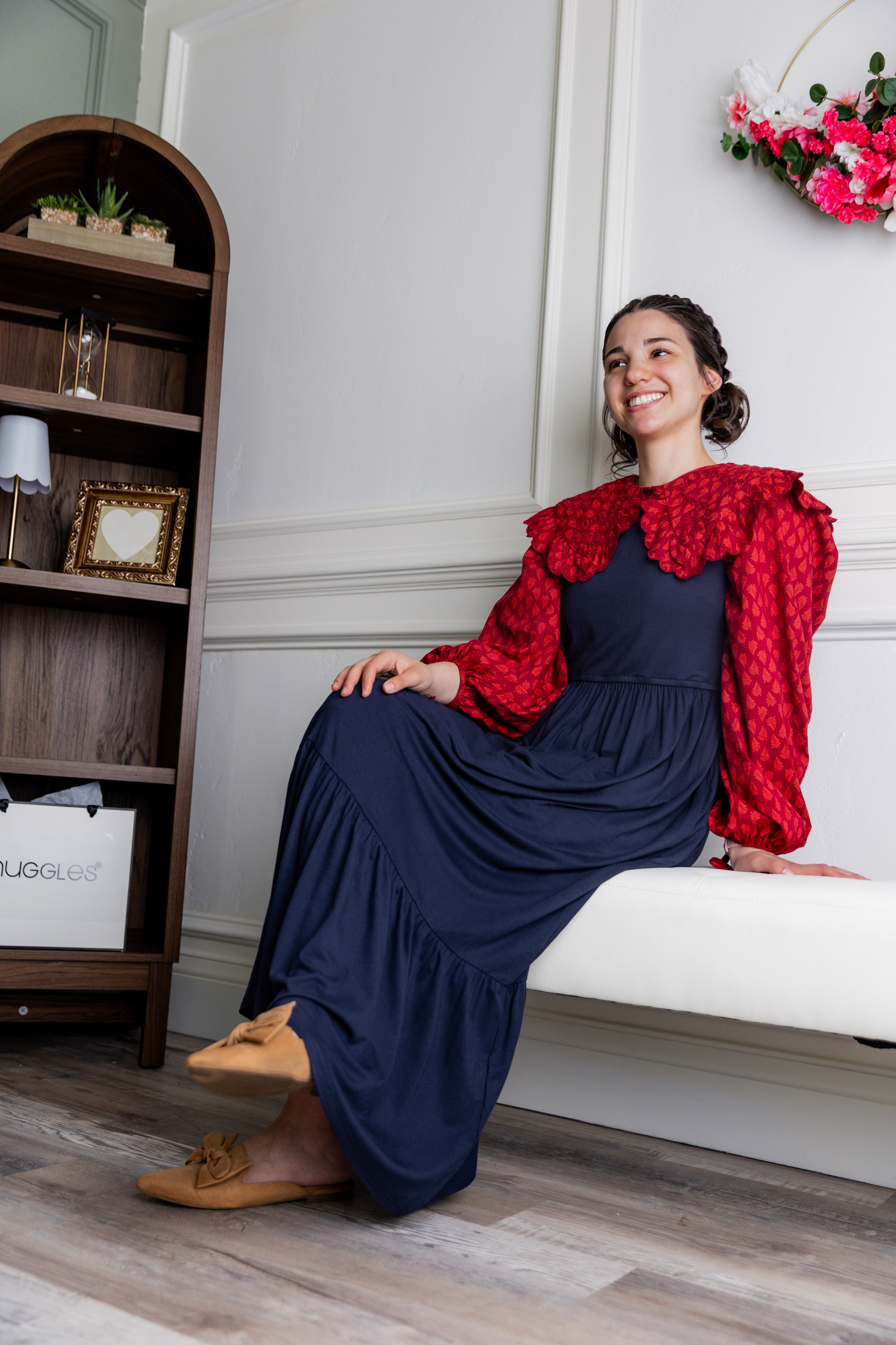 Model wearing the Nuggles® Riley Dress in Navy