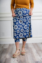 Modest activewear skirt with built-in leggings for women, breathable athletic fabric, paired with sneakers – perfect for workouts or casual wear.