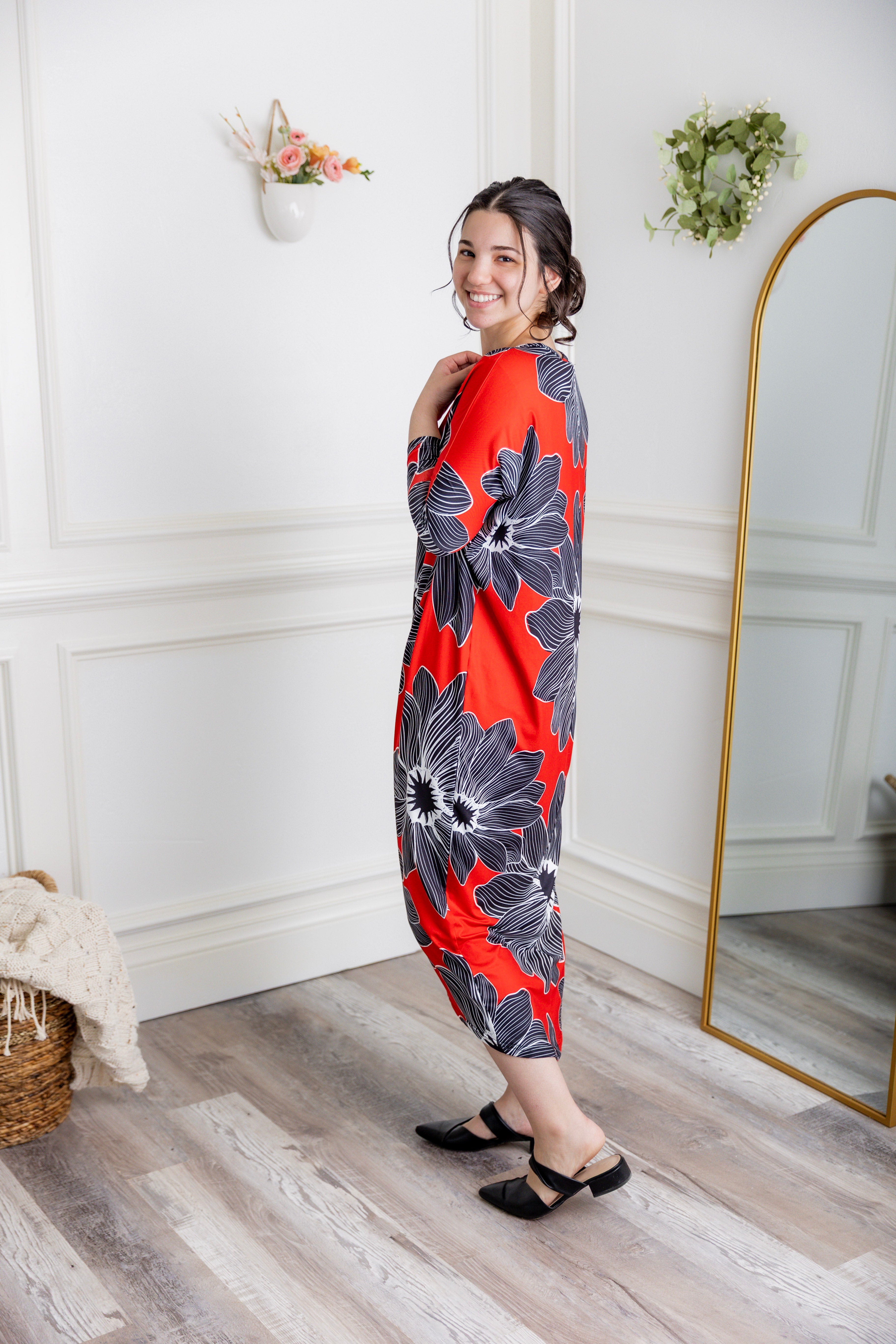 Modest dolman sleeve dress for women with relaxed fit and tapered hem, made from soft stretch knit fabric – perfect for everyday wear.