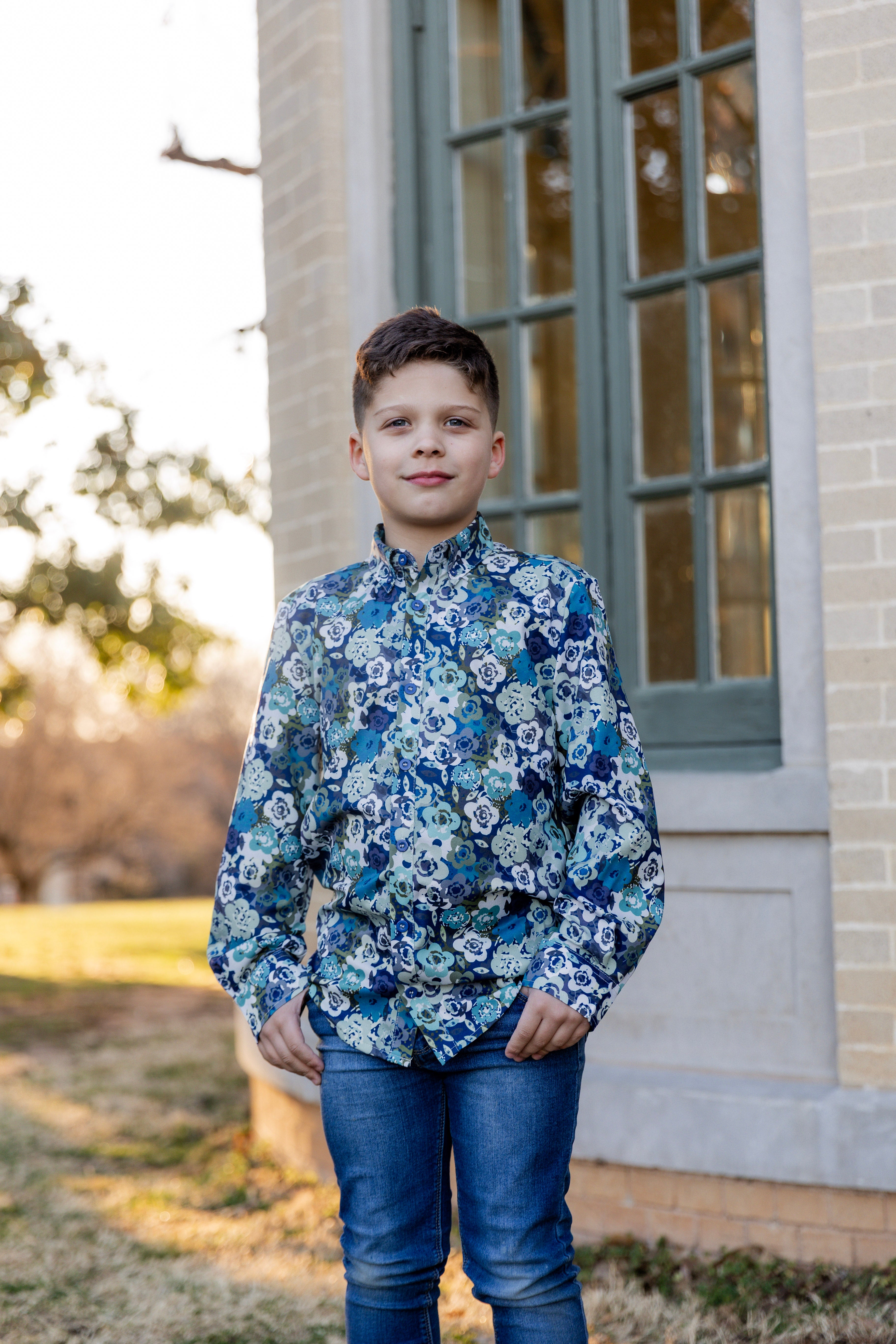 Model wearing Nuggles® Boys' Button Down Shirt Storm Brush