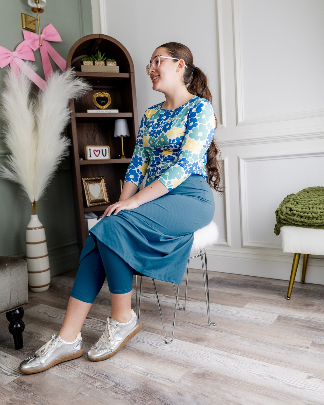 Model wearing Nuggles® 31" All-Sport Skirt in Turquoise