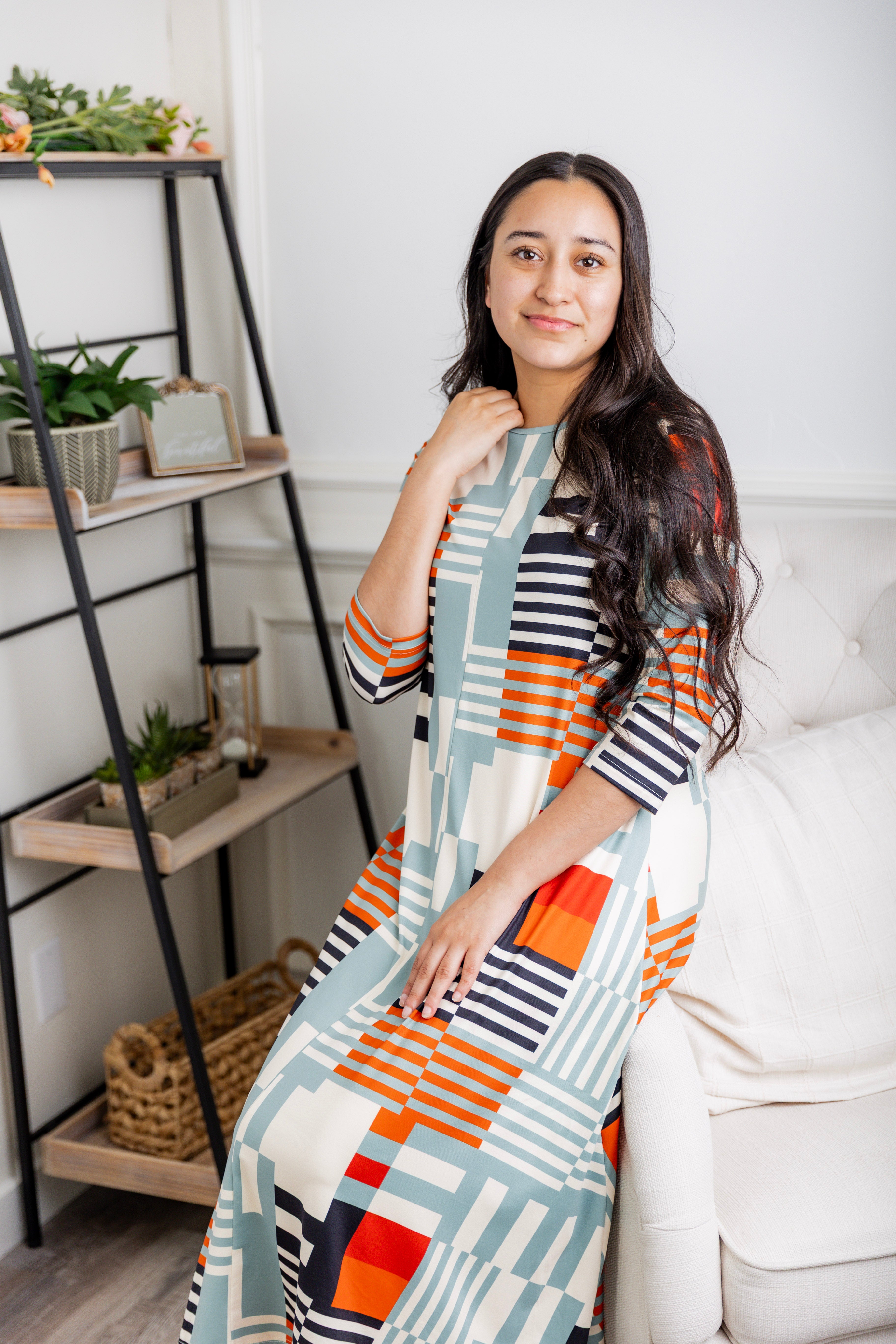 Model wearing the Nuggles® Liana Dress – modest midi dress with ¾ sleeves