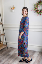 Model wearing Emma Bubble Dress in pretty prints, showcasing full bubble skirt and modest fit.