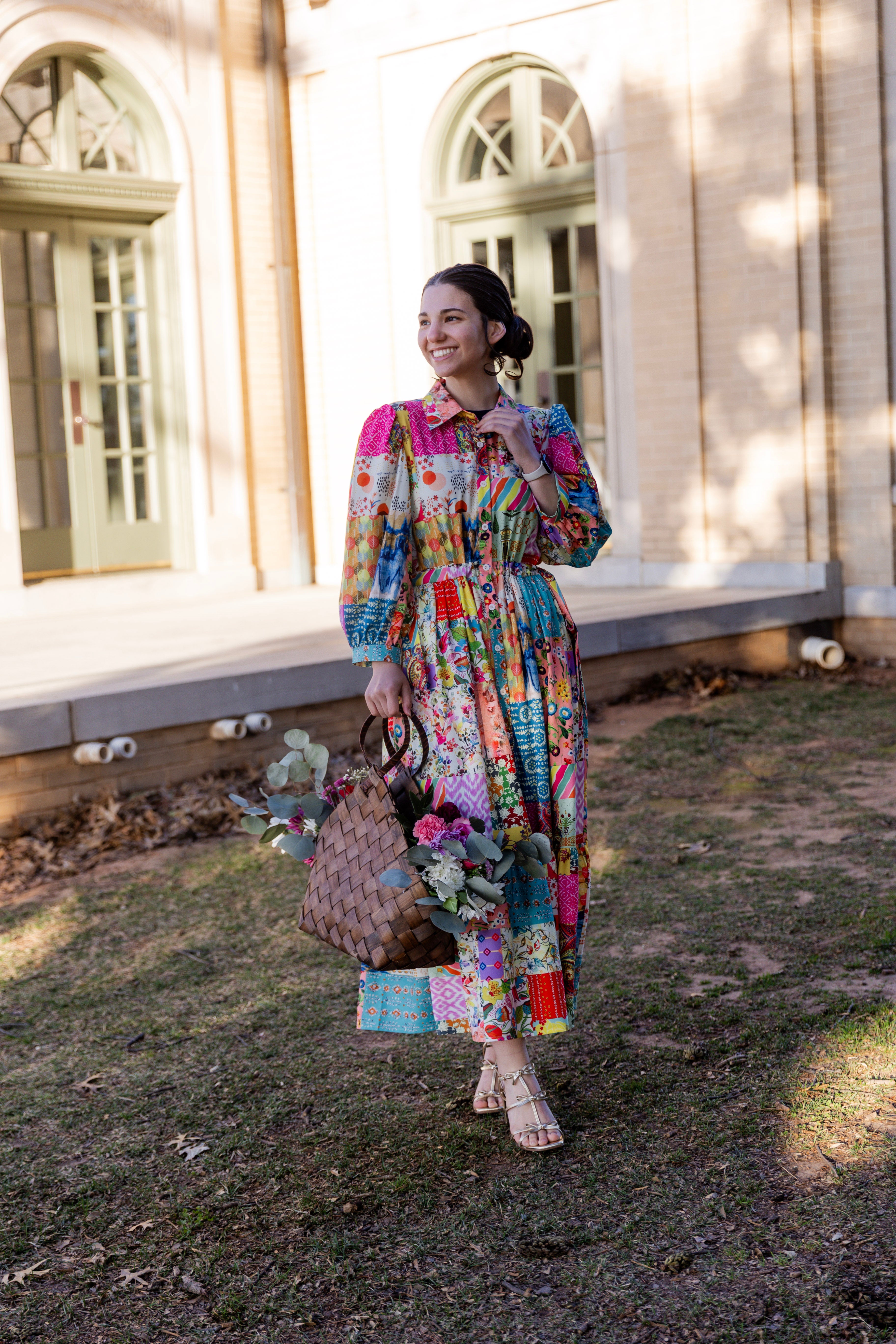 Model wearing the Nuggles® Leila Dress in Keepsake Quilt