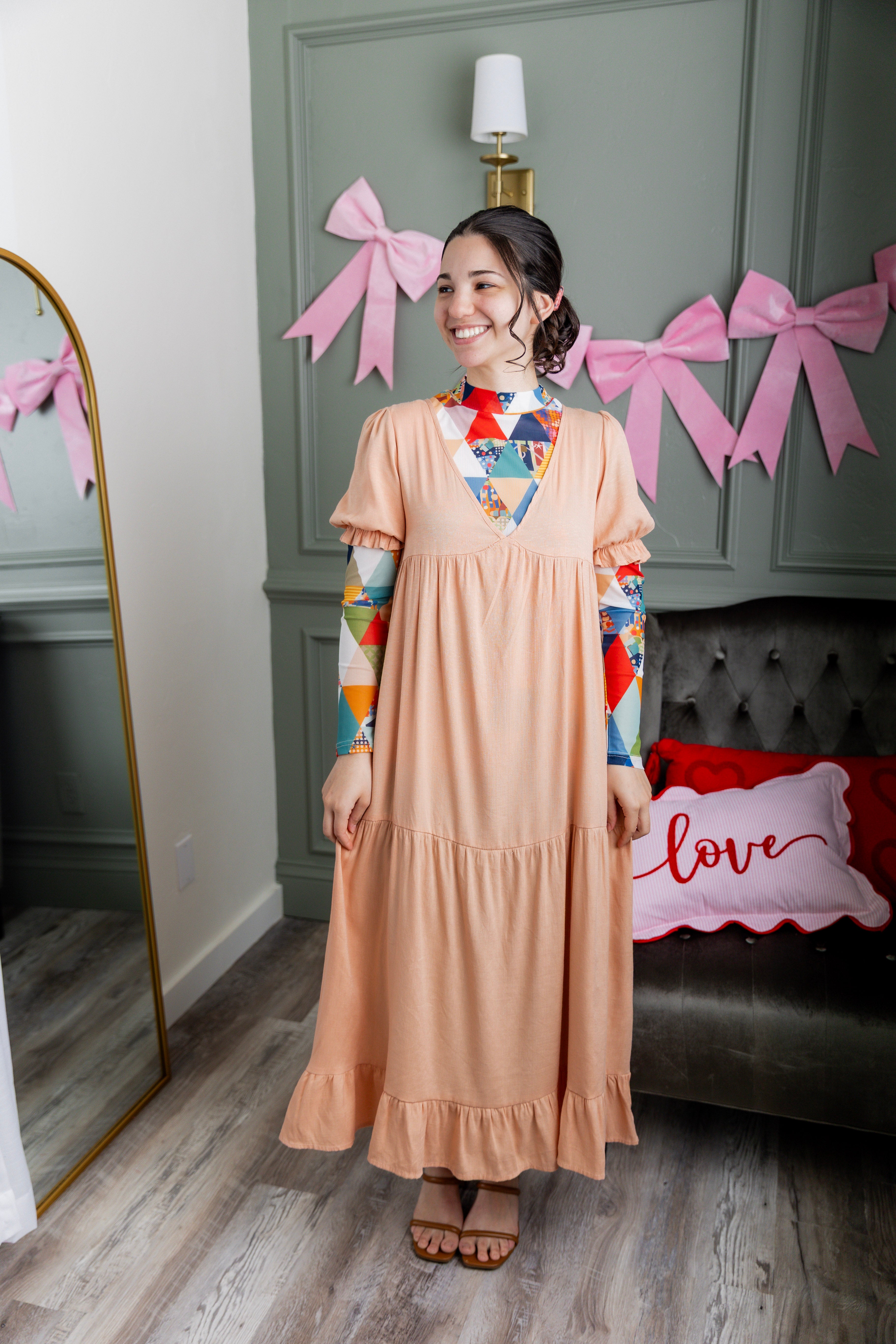 Model wearing Nuggles® Mesh Tee top in Triangle Taffy