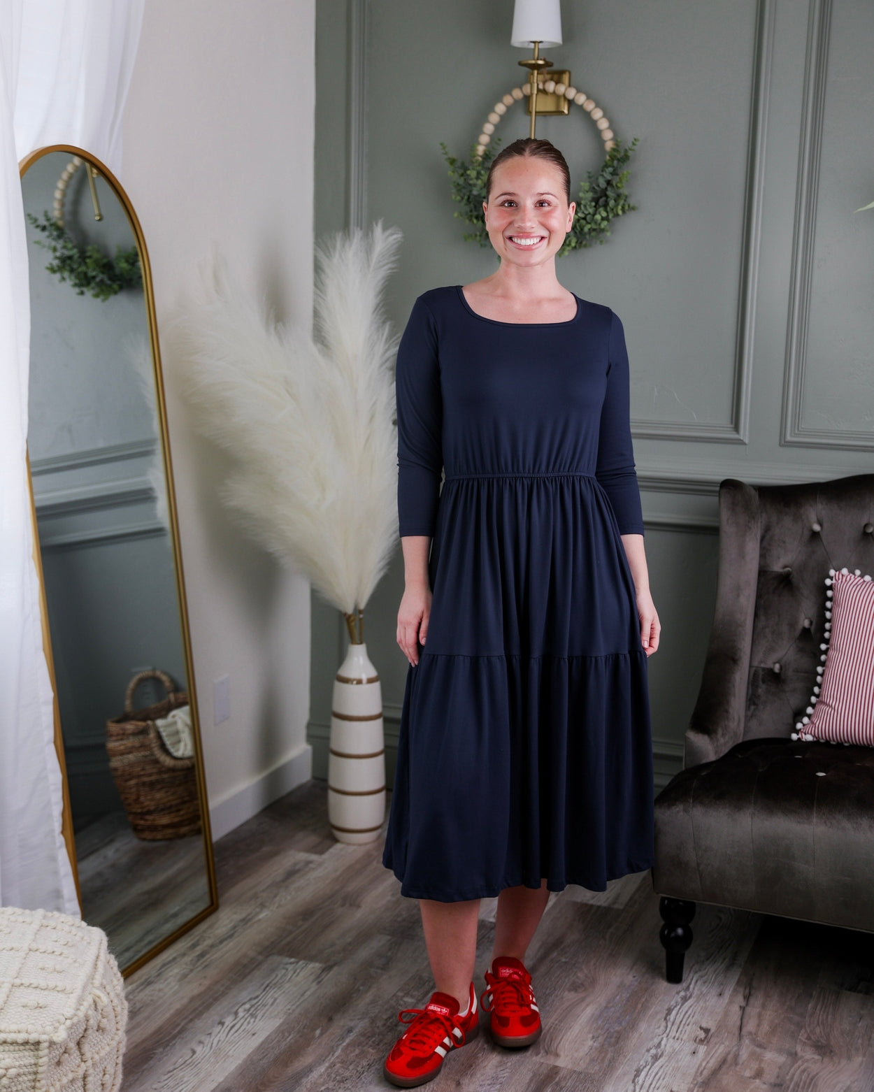 Model wearing Nuggles® Nova Dress in Navy
