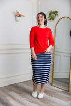 27-inch inch modest midi tee skirts in solid colors, prints, featuring a wide yoga-style waistband and soft stretch t-shirt fabric