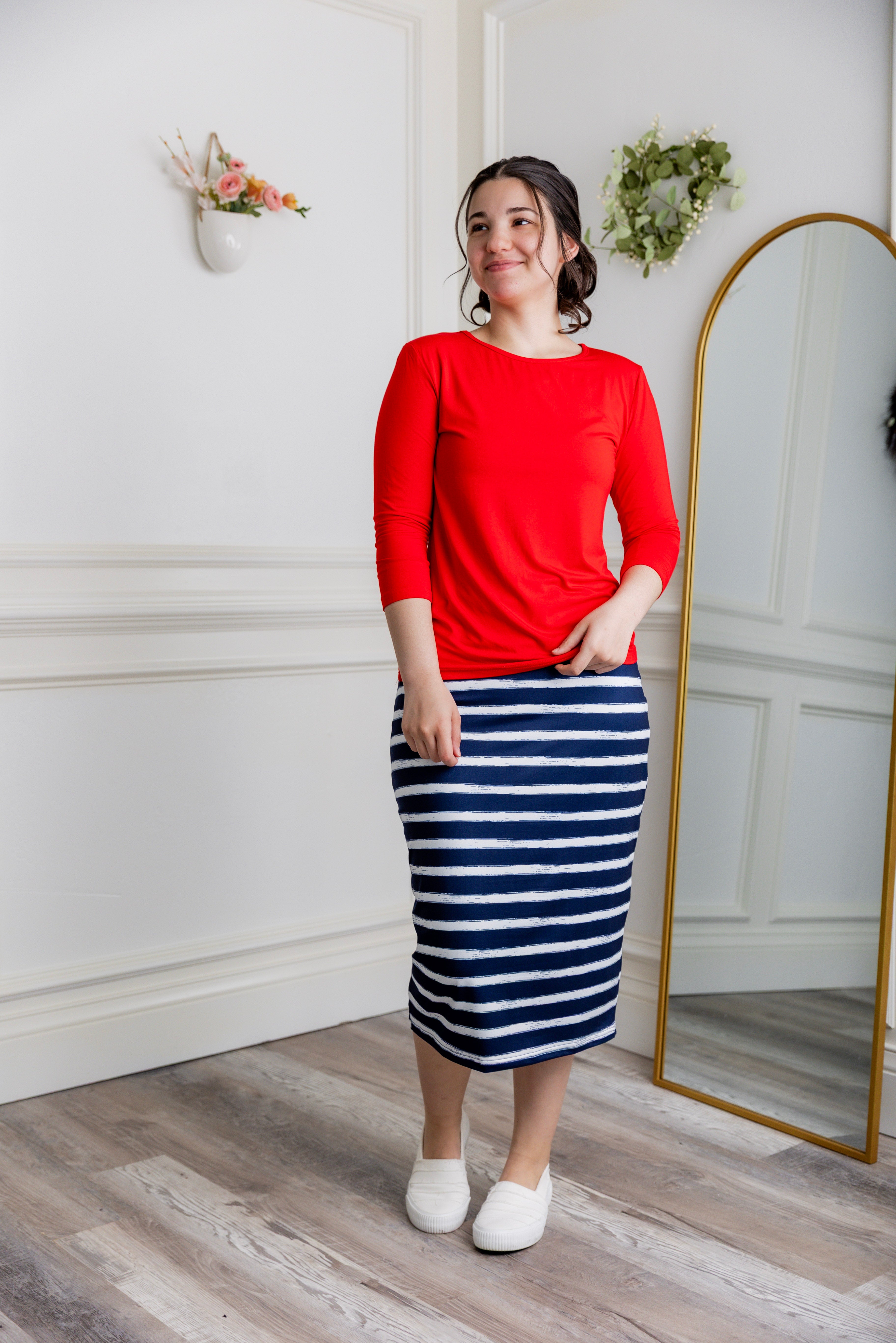 27-inch inch modest midi tee skirts in solid colors, prints, featuring a wide yoga-style waistband and soft stretch t-shirt fabric