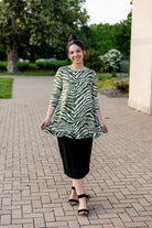 Model wearing the Avery Top, featuring modest 3/4 sleeves and a flowy, flattering fit.