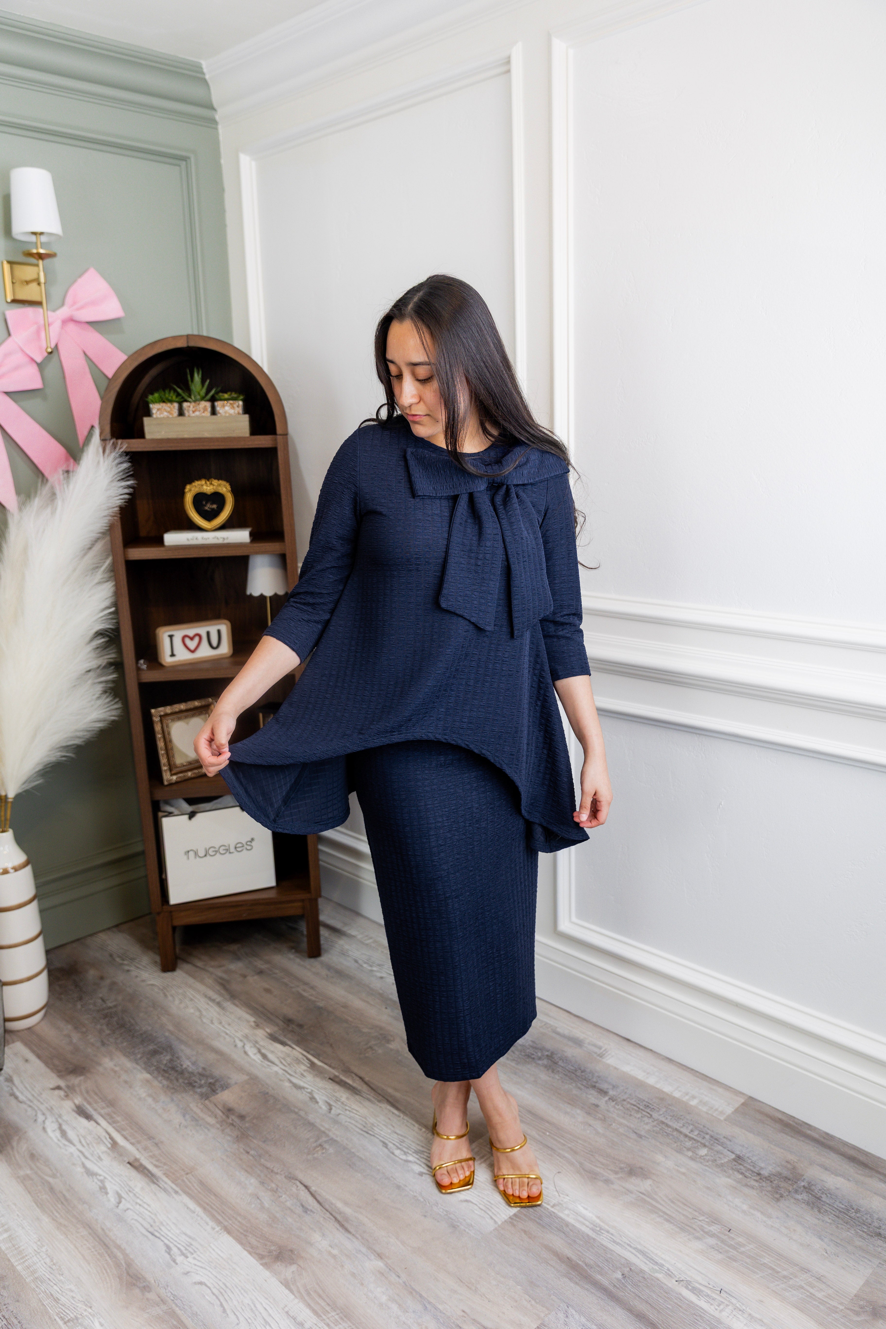 Model wearing Nuggles® 31' Eleanor Skirt in Navy