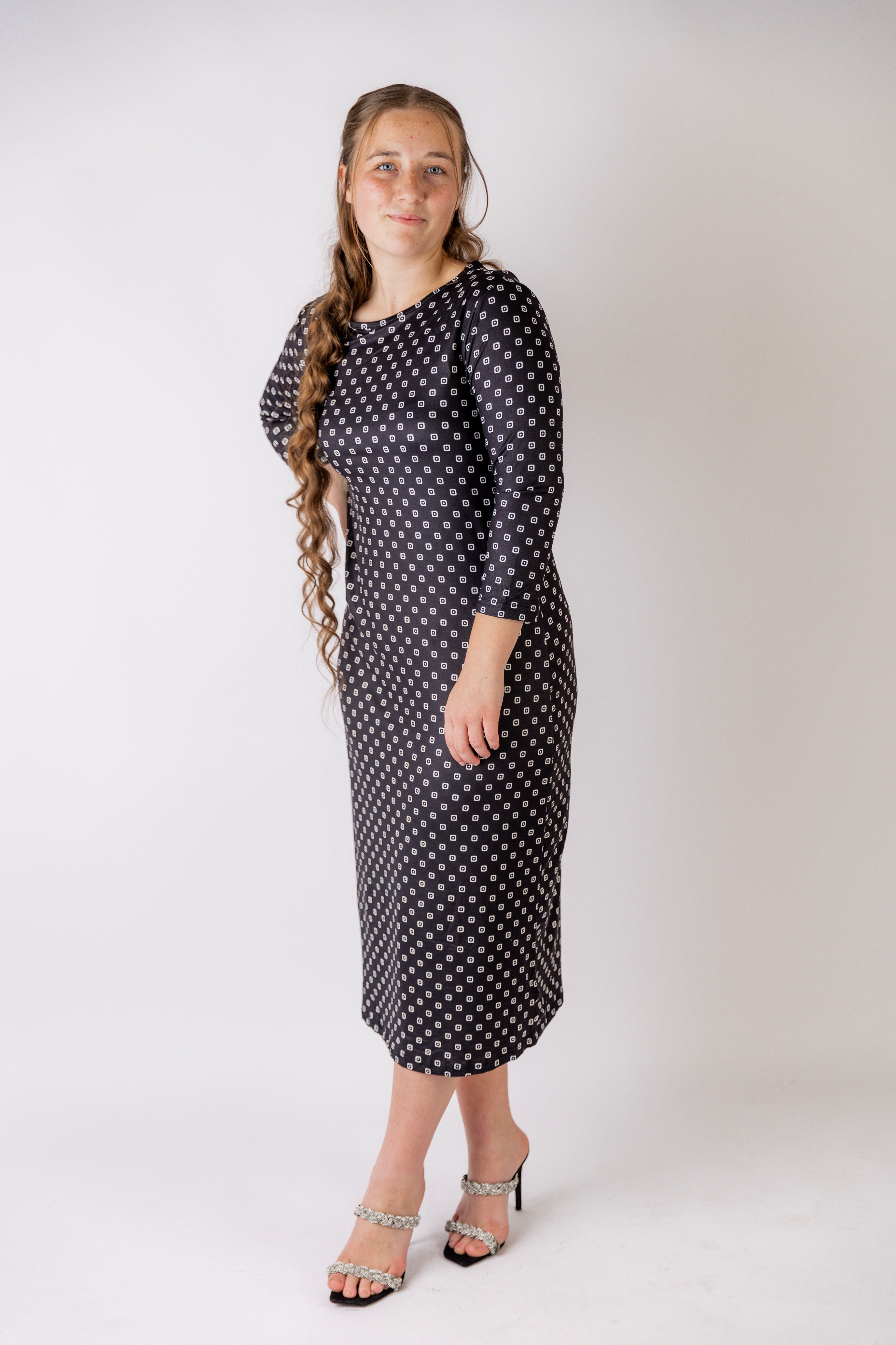 Model wearing the Nuggles® Original Midi Layering Dress in Midnight Mist