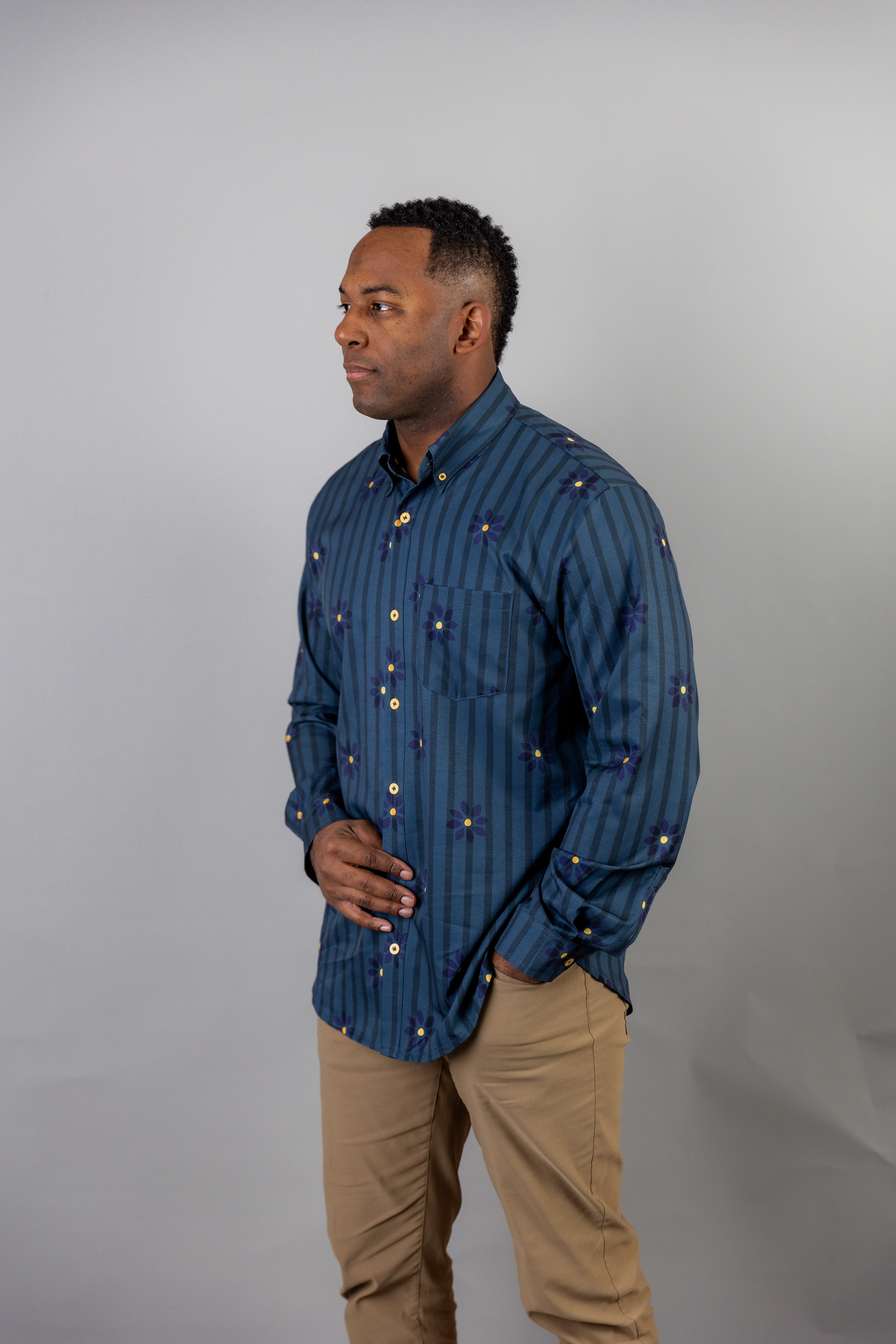 Model wearing Nuggles® Men's Button Down Shirt in Pinstripe Ditsy