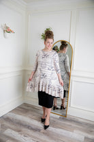 Modest print tunic for women – Nuggles® Rose Top with high-low ruffle hem and 3/4 sleeves.