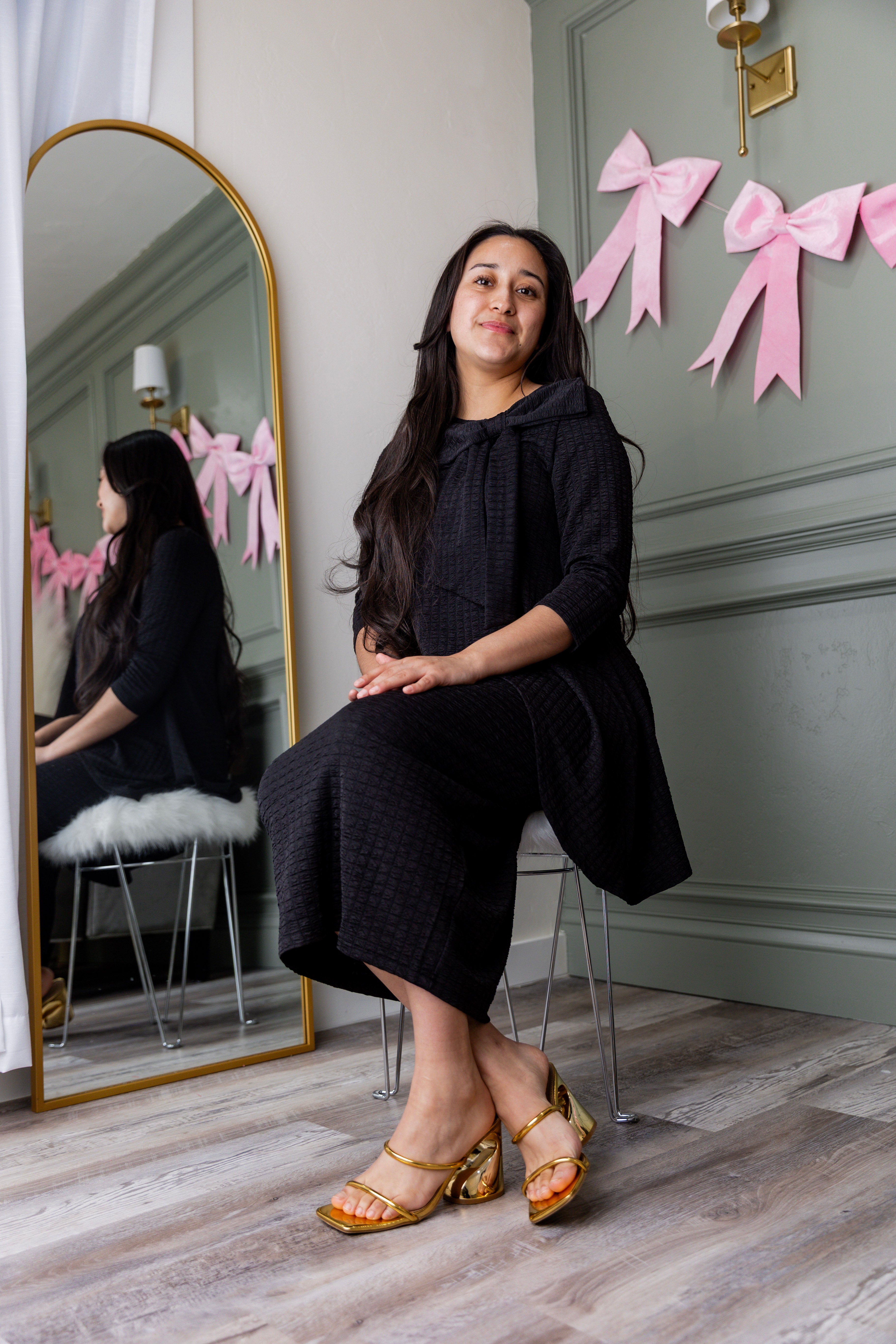 Model wearing Nuggles® Eleanor Top in Black