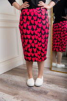 27-inch inch modest midi tee skirts in solid colors, prints, featuring a wide yoga-style waistband and soft stretch t-shirt fabric