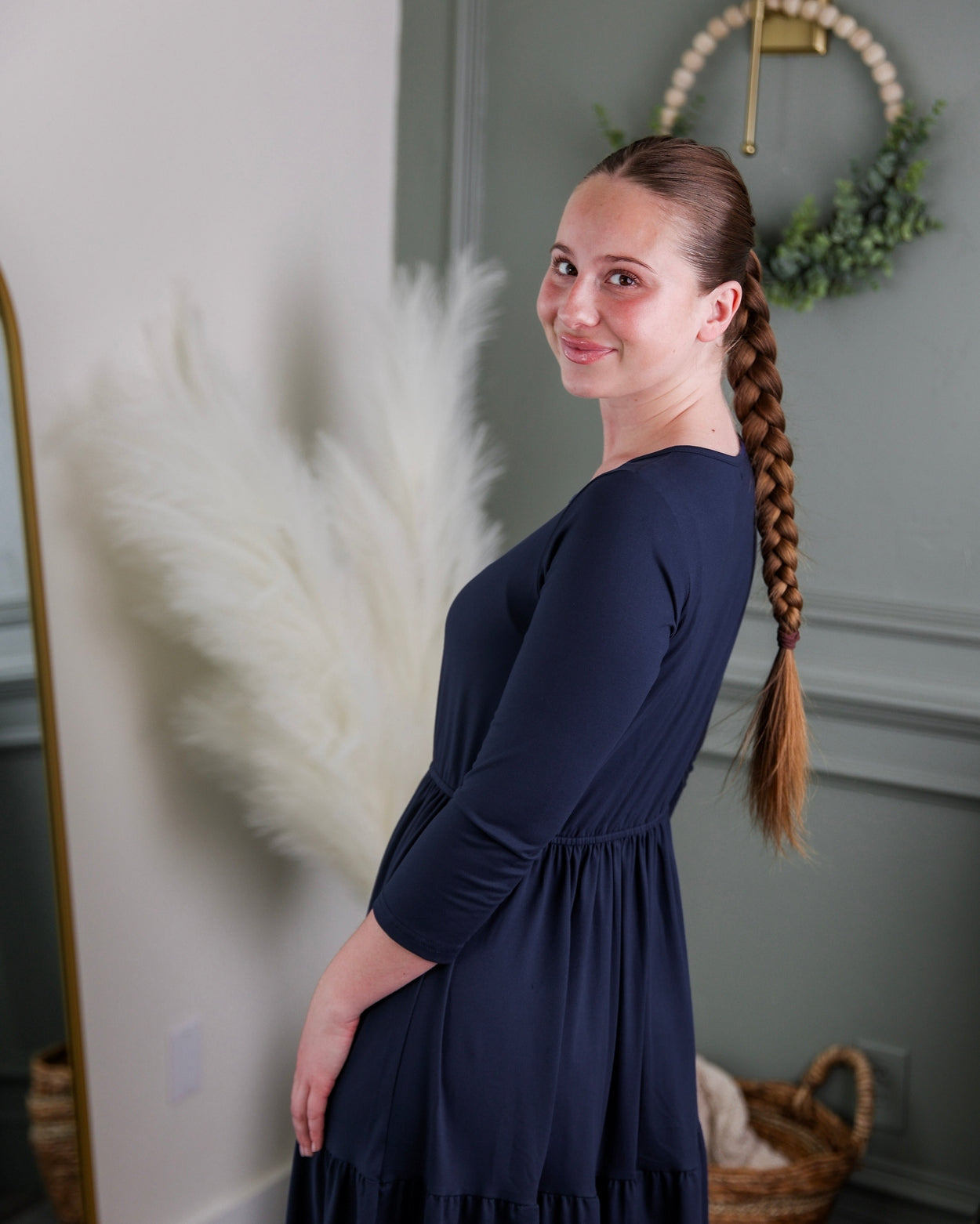 Model wearing Nuggles® Nova Dress in Navy