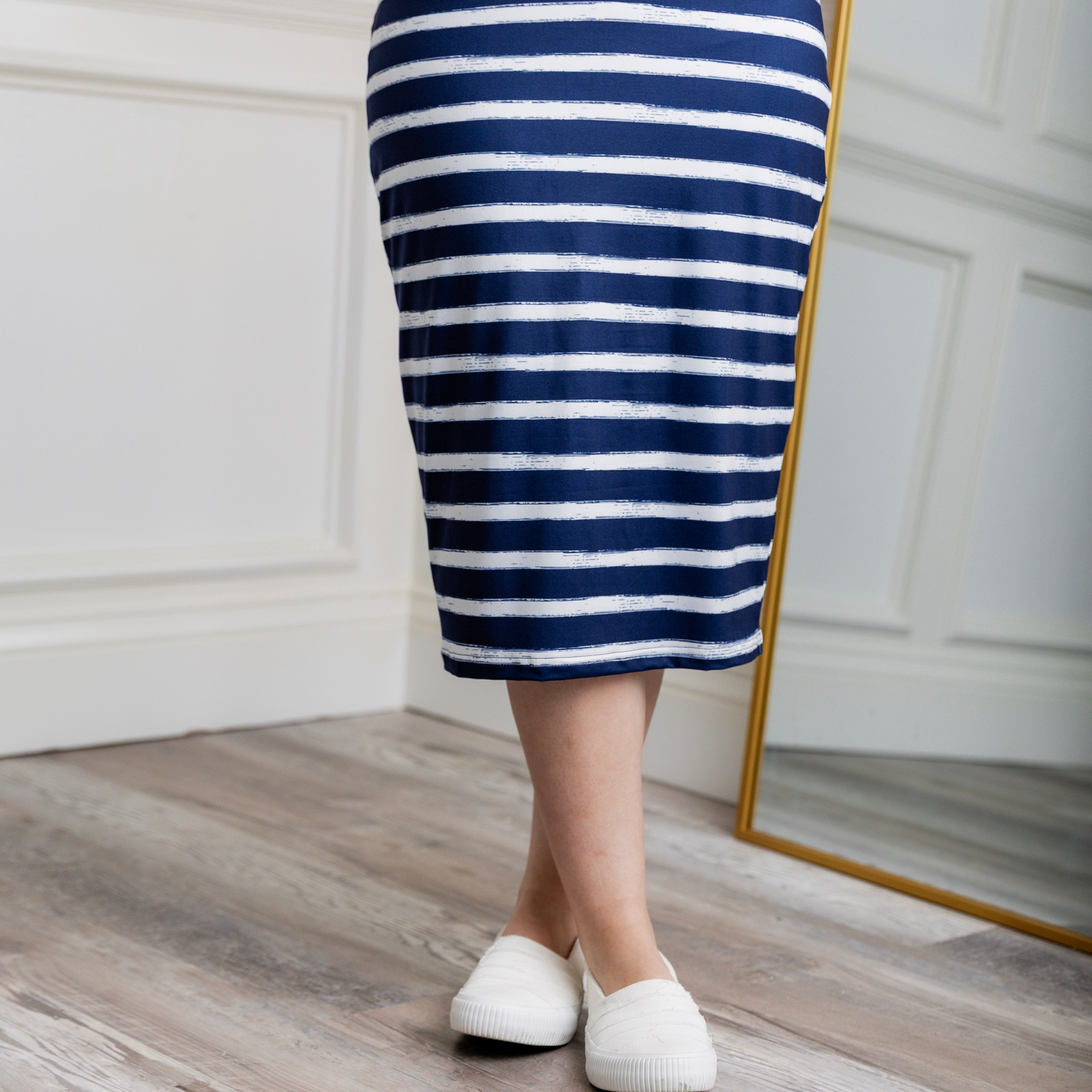 27-inch inch modest midi tee skirts in solid colors, prints, featuring a wide yoga-style waistband and soft stretch t-shirt fabric