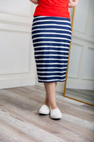 27-inch inch modest midi tee skirts in solid colors, prints, featuring a wide yoga-style waistband and soft stretch t-shirt fabric