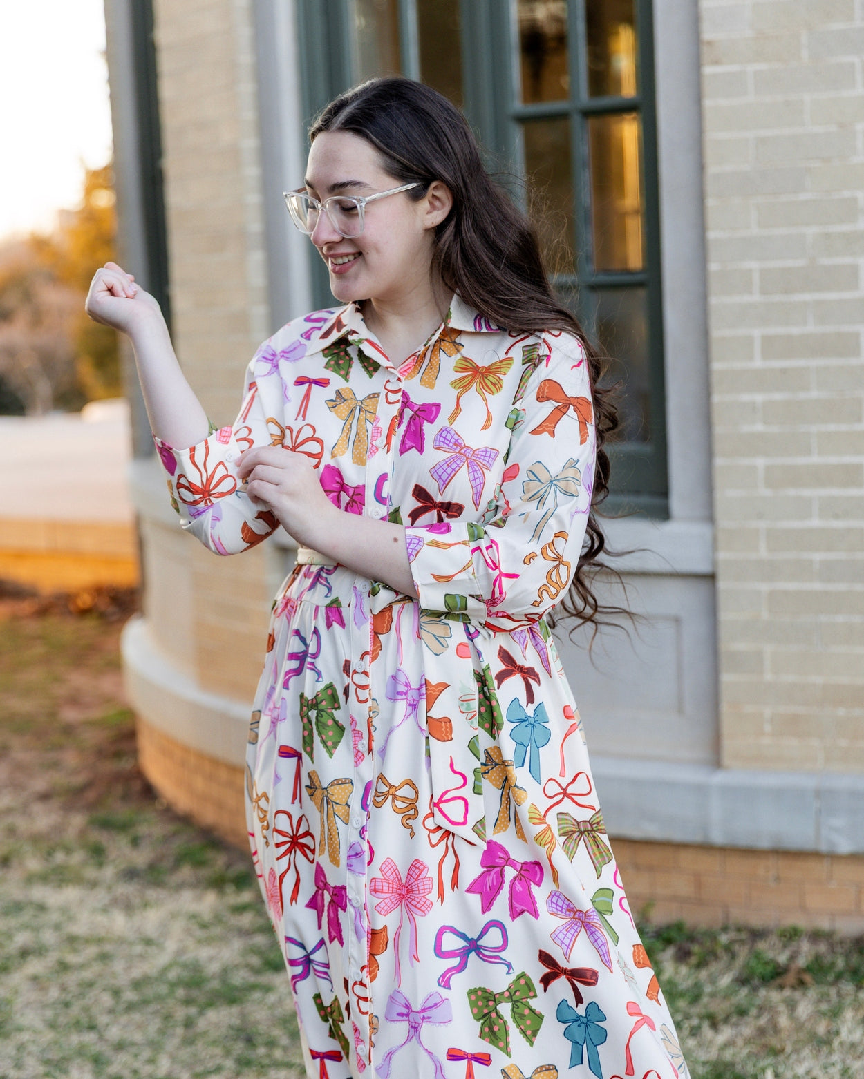 Model wearing the Nuggles® Rachel Dress in Bow Garden