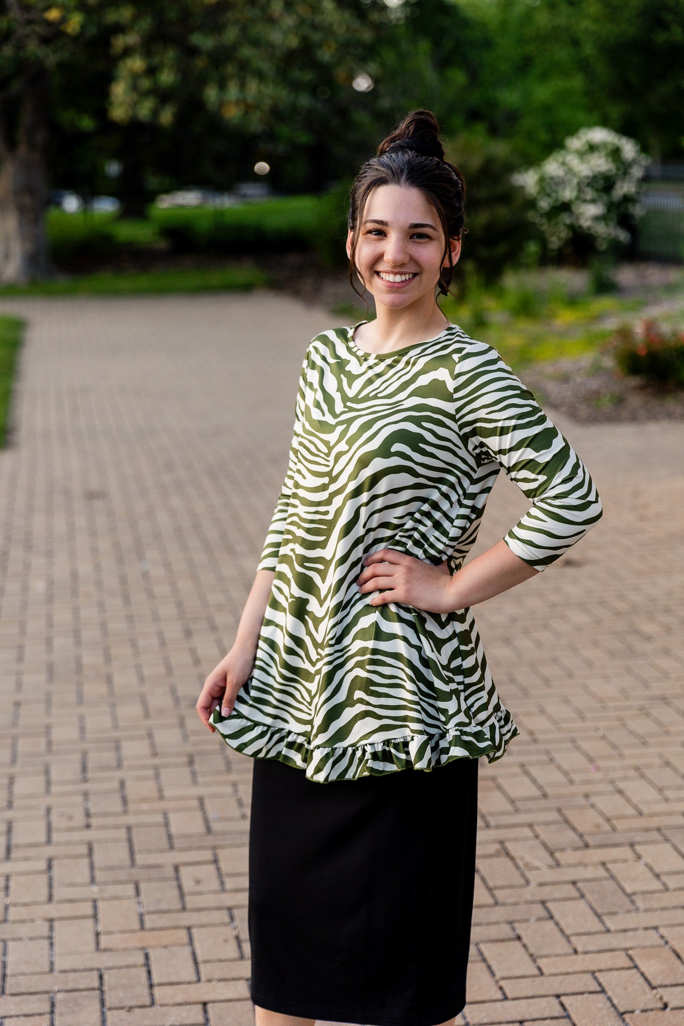 Model wearing the Avery Top, featuring modest 3/4 sleeves and a flowy, flattering fit.