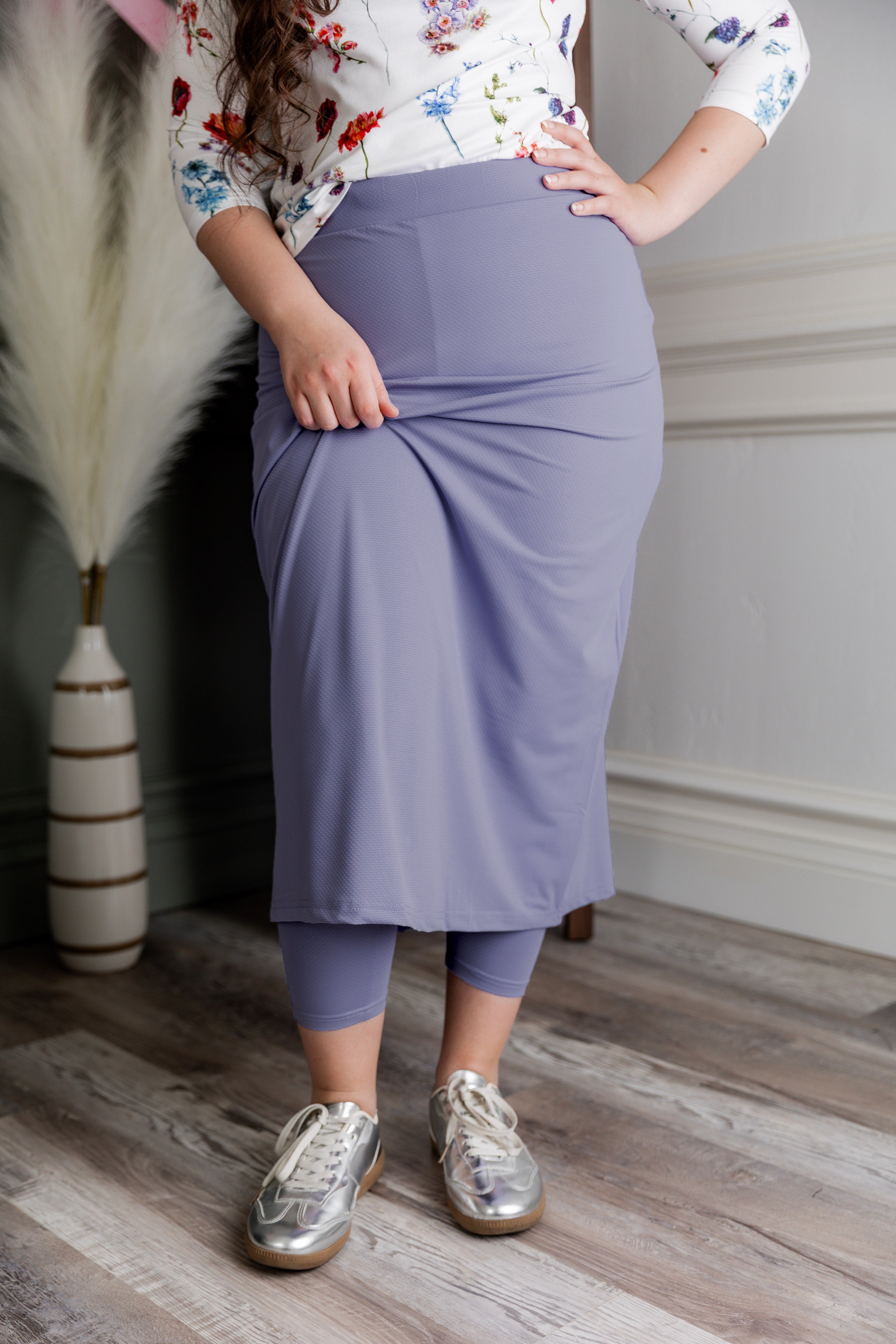 Model wearing Nuggles® 31" All-Sport Skirt in Pastel Purple