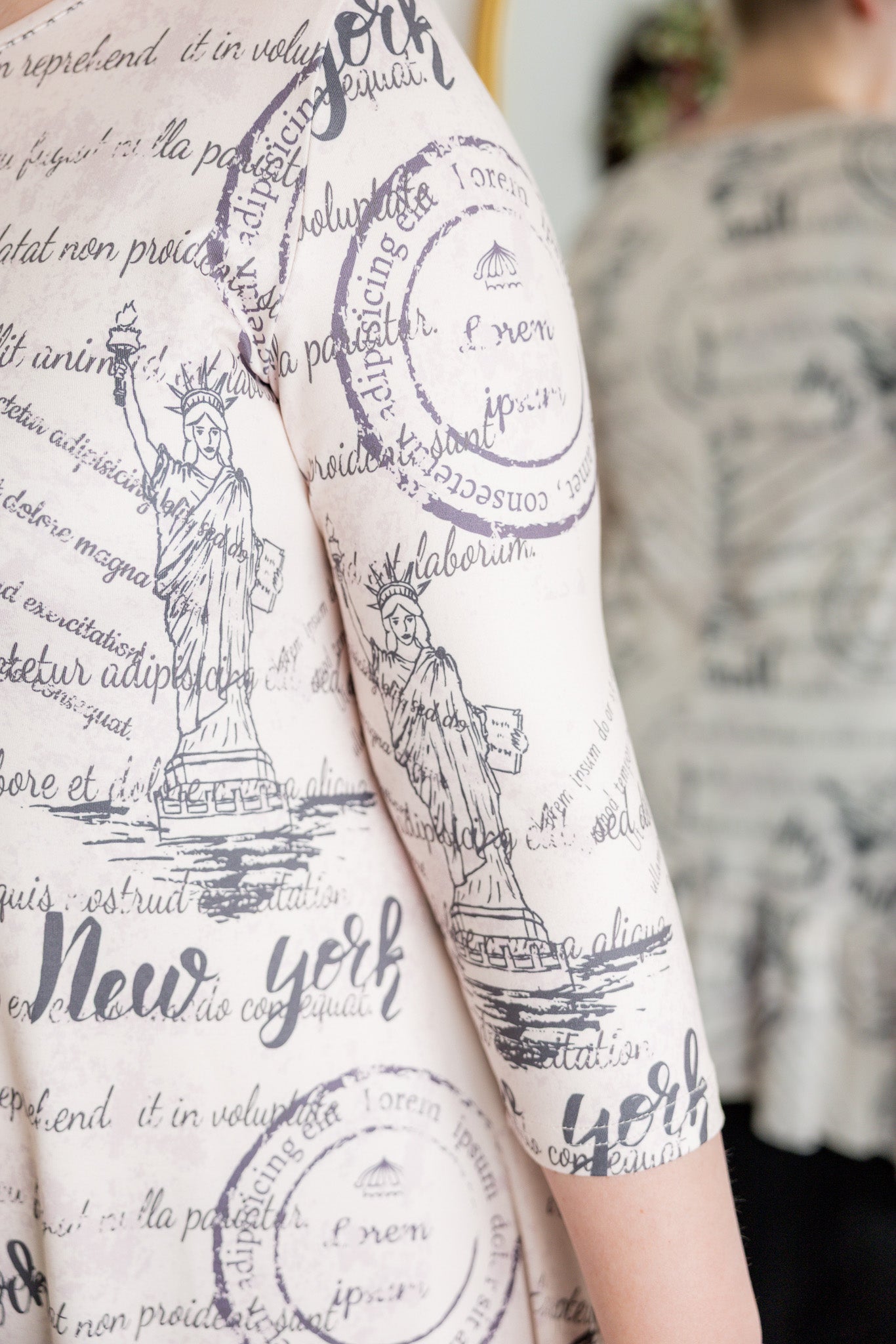 Modest print tunic for women – Nuggles® Rose Top with high-low ruffle hem and 3/4 sleeves.