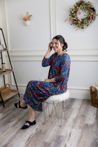 Model wearing Emma Bubble Dress in pretty prints, showcasing full bubble skirt and modest fit.