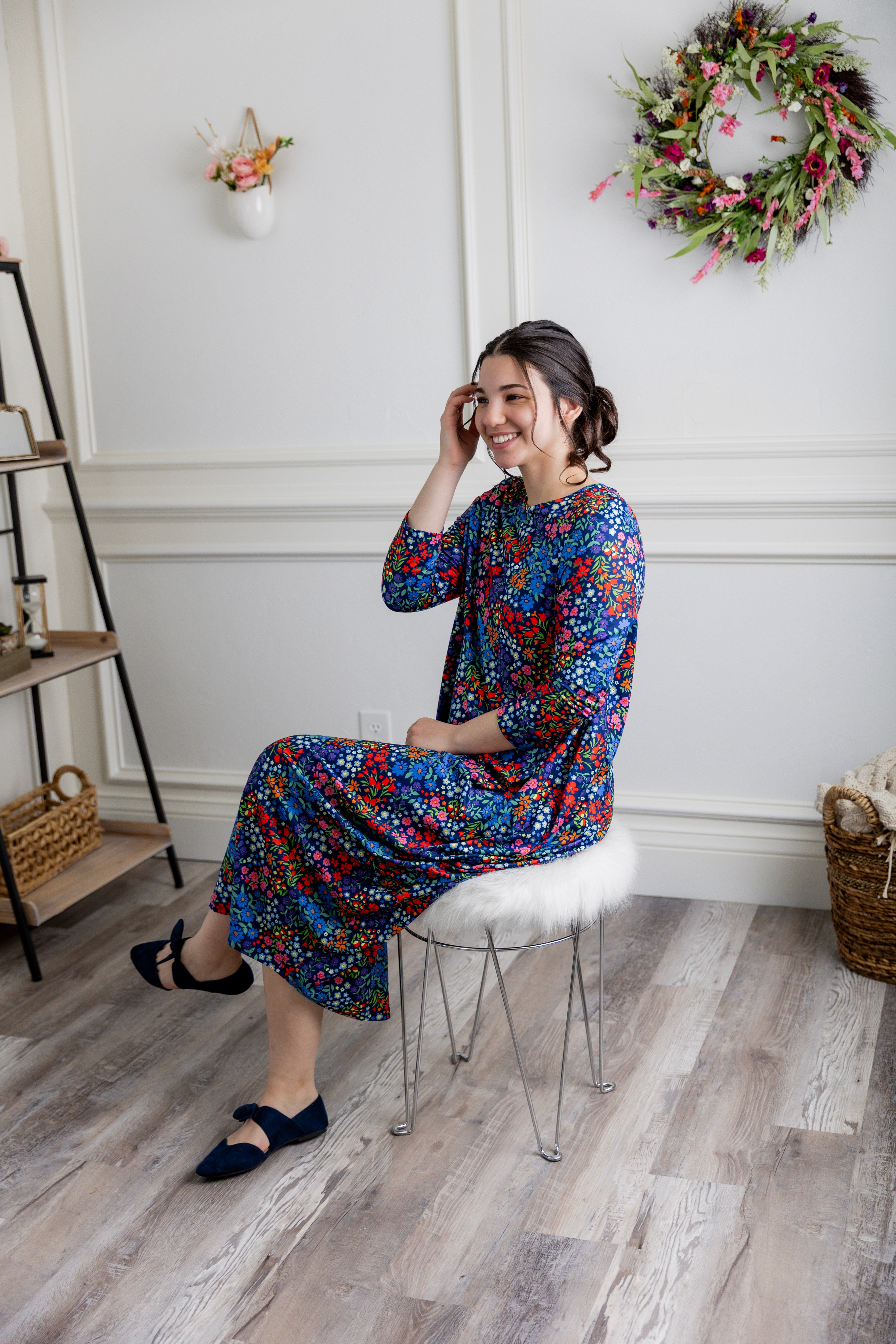 Model wearing Emma Bubble Dress in pretty prints, showcasing full bubble skirt and modest fit.